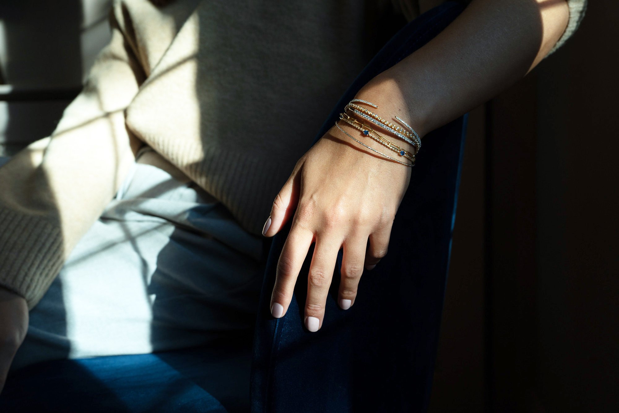 female-wrist-wearing-diamond-bangles.jpg