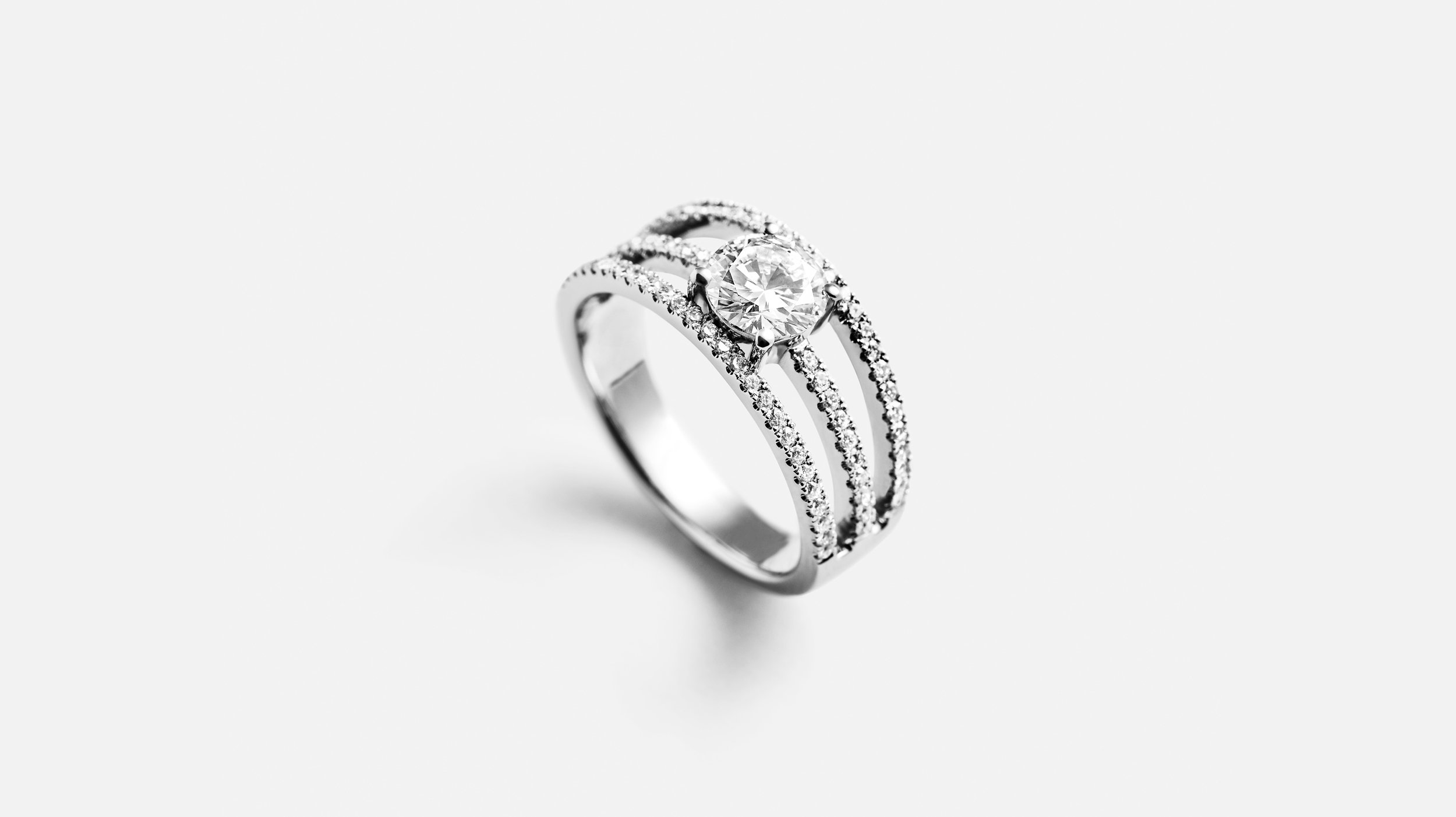 white-gold-diamond-ring-with-three-bands-of-diamonds.jpg