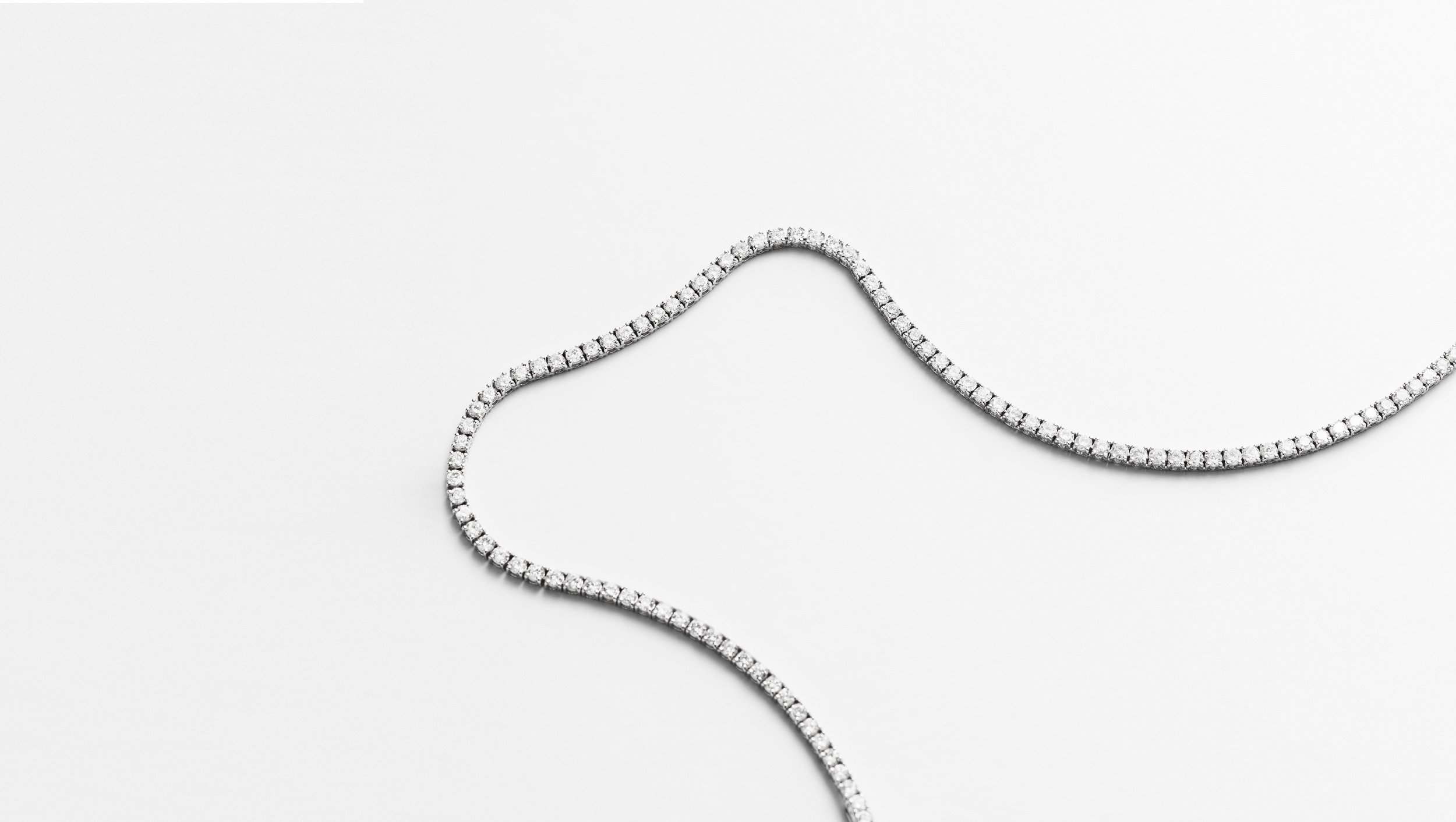 white-gold-diamond-tennis-necklace.jpg