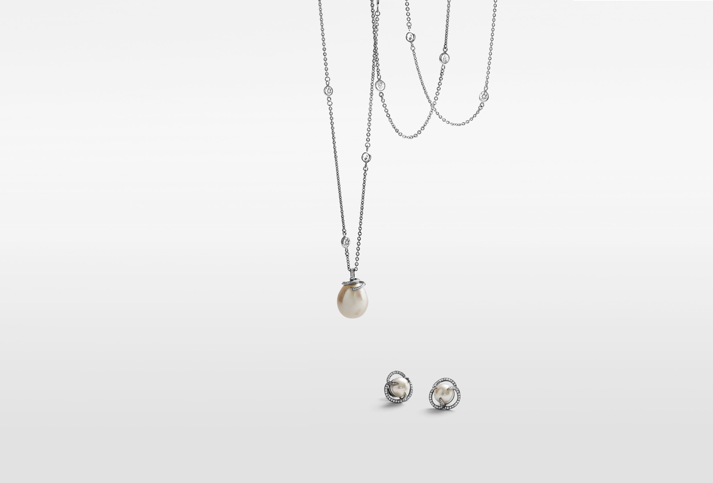 pearl-and-diamond-drop-necklace-and-matching-stud-earrings.jpg