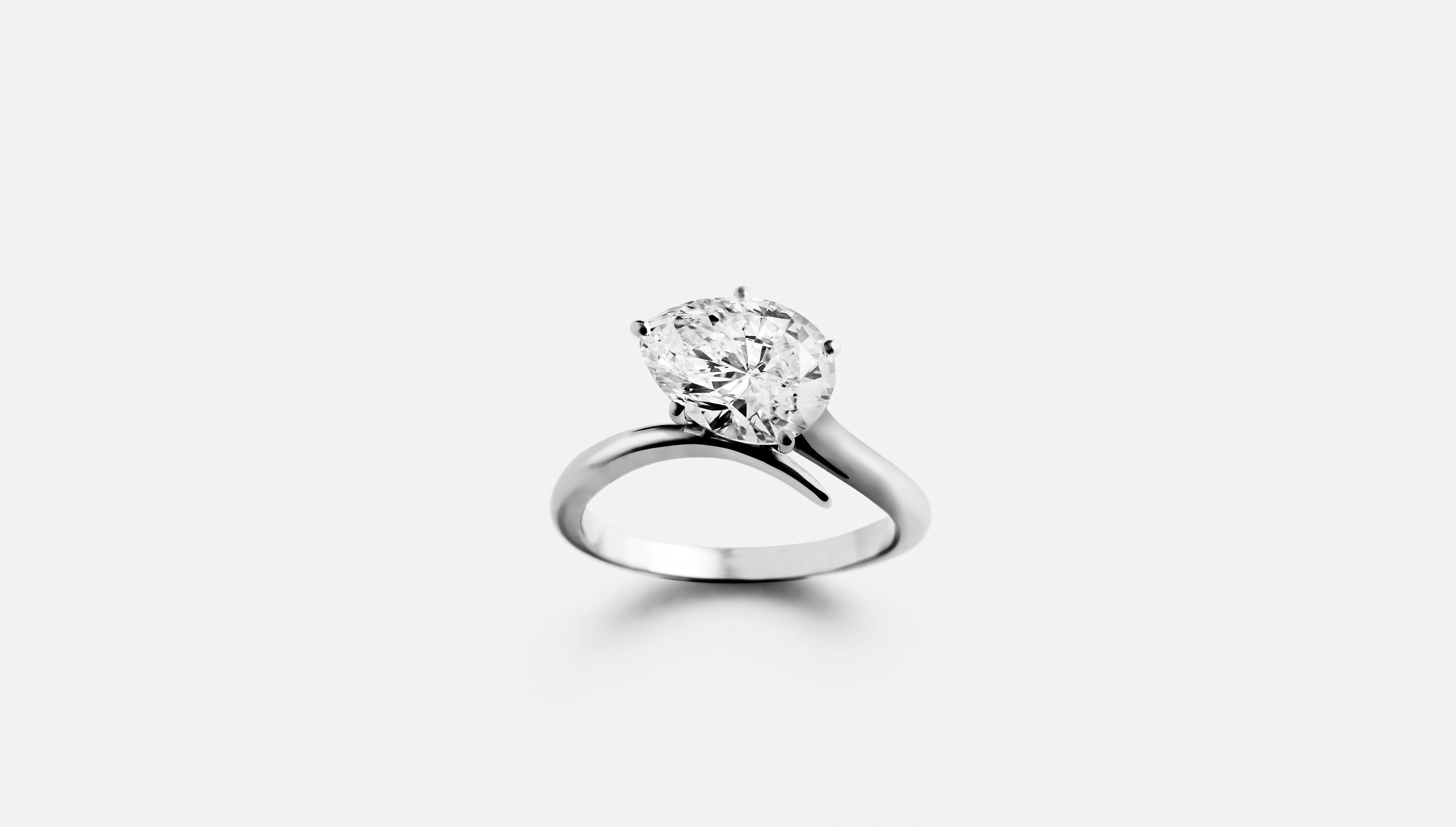 white-gold-pear-shaped-diamond-ring-0n-white-background.jpg