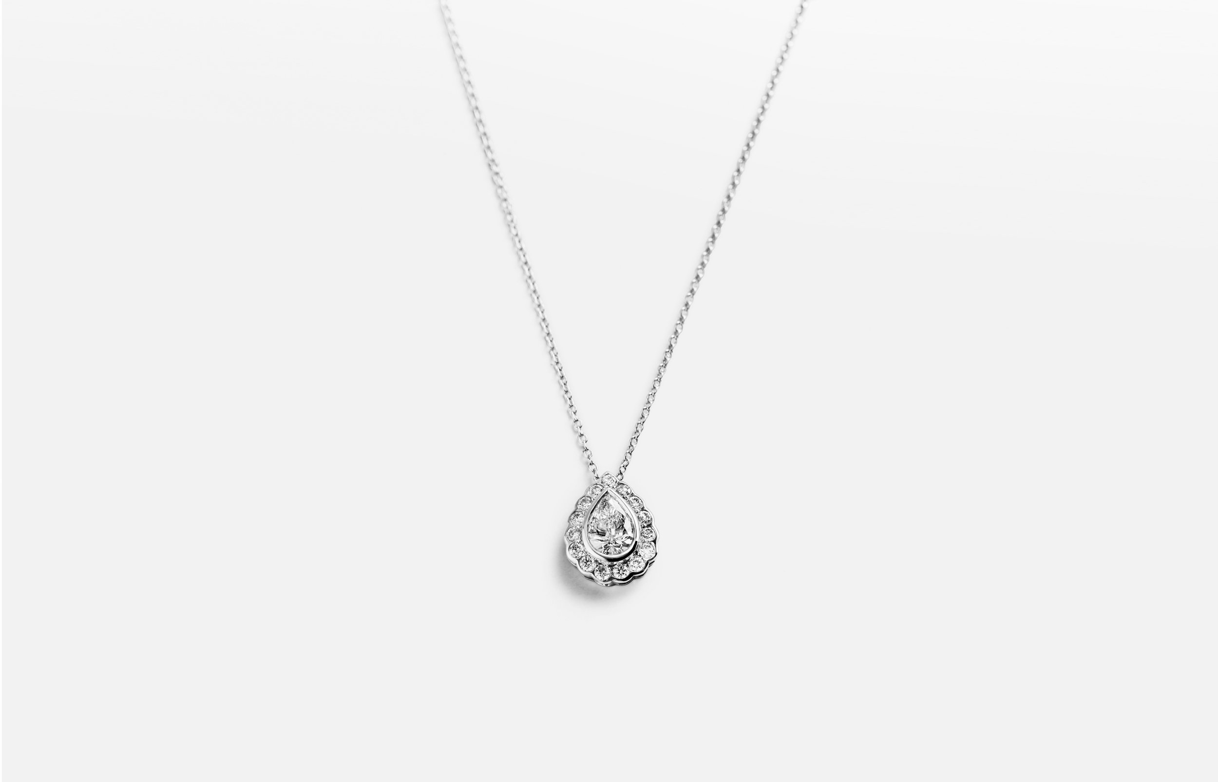 pear-shaped-white-gold-silver-diamond-pendant.jpg