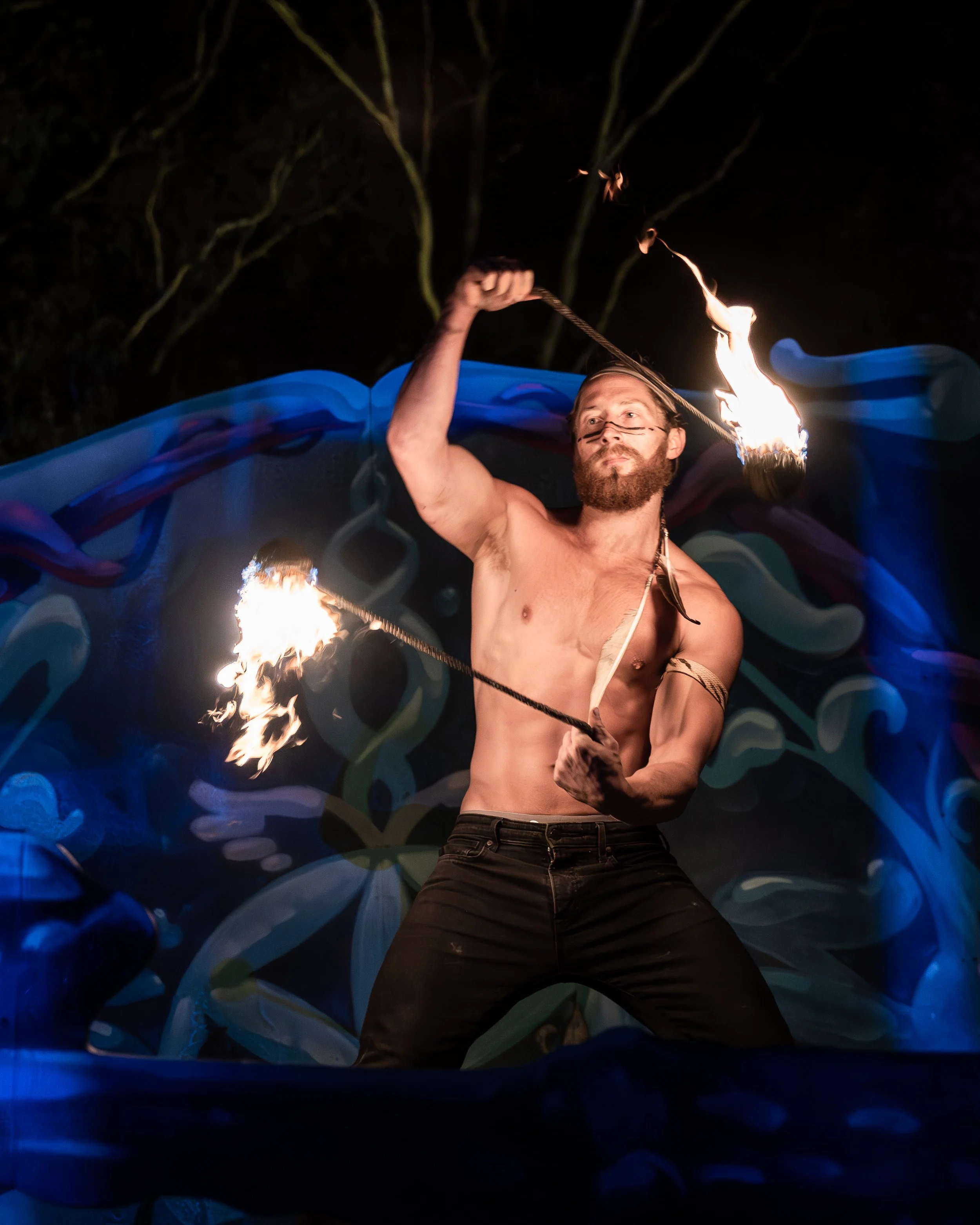 FIRE PERFORMER, PHOTO BY SPRITZ THE WORLD STUDIO.