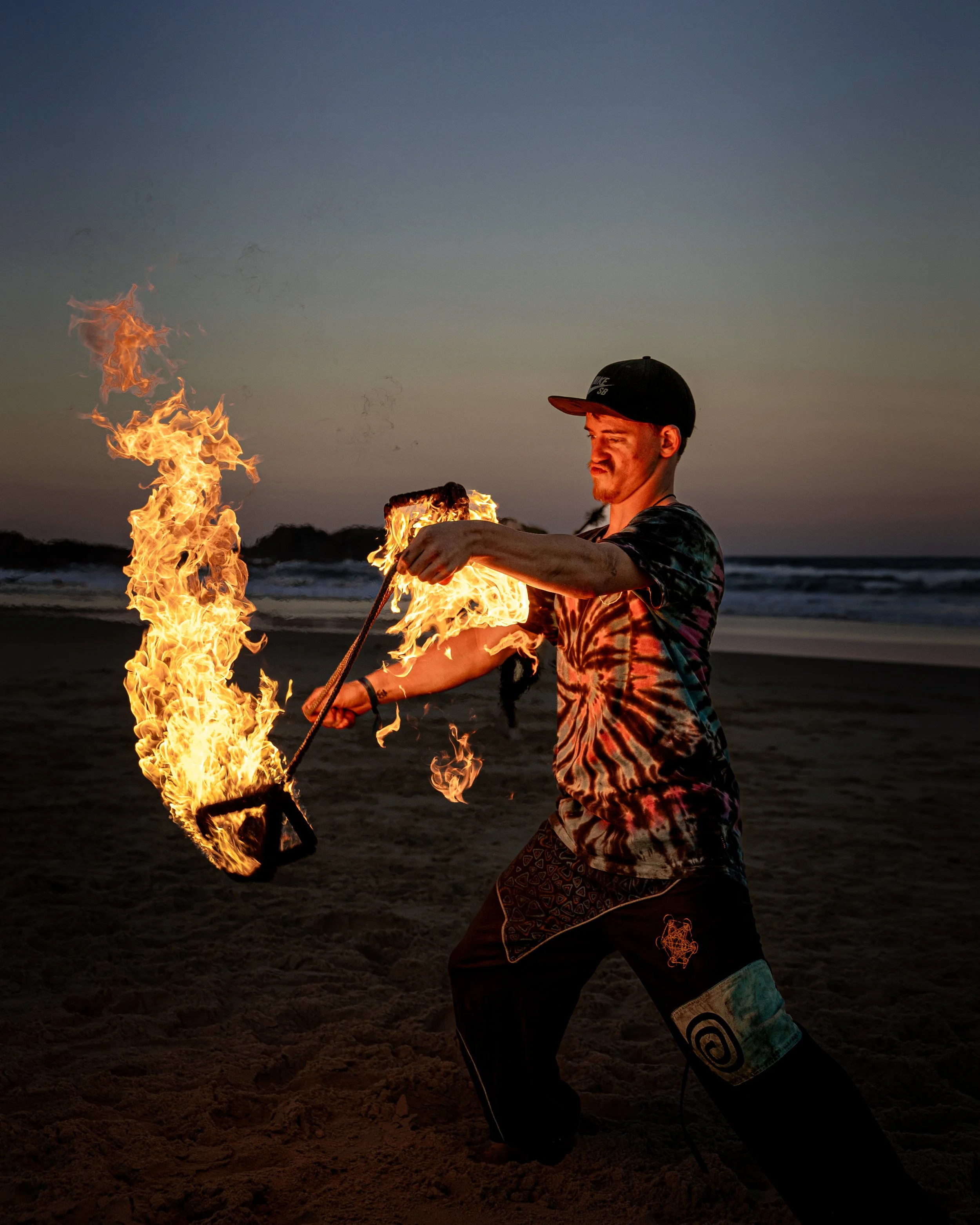 GLOWFEST FESTIVAL AUSTRALIA, FIRE PERFORMER PHOTO BY MYCOL CAVALIERI- SPRITZ THE WORLD STUDIO