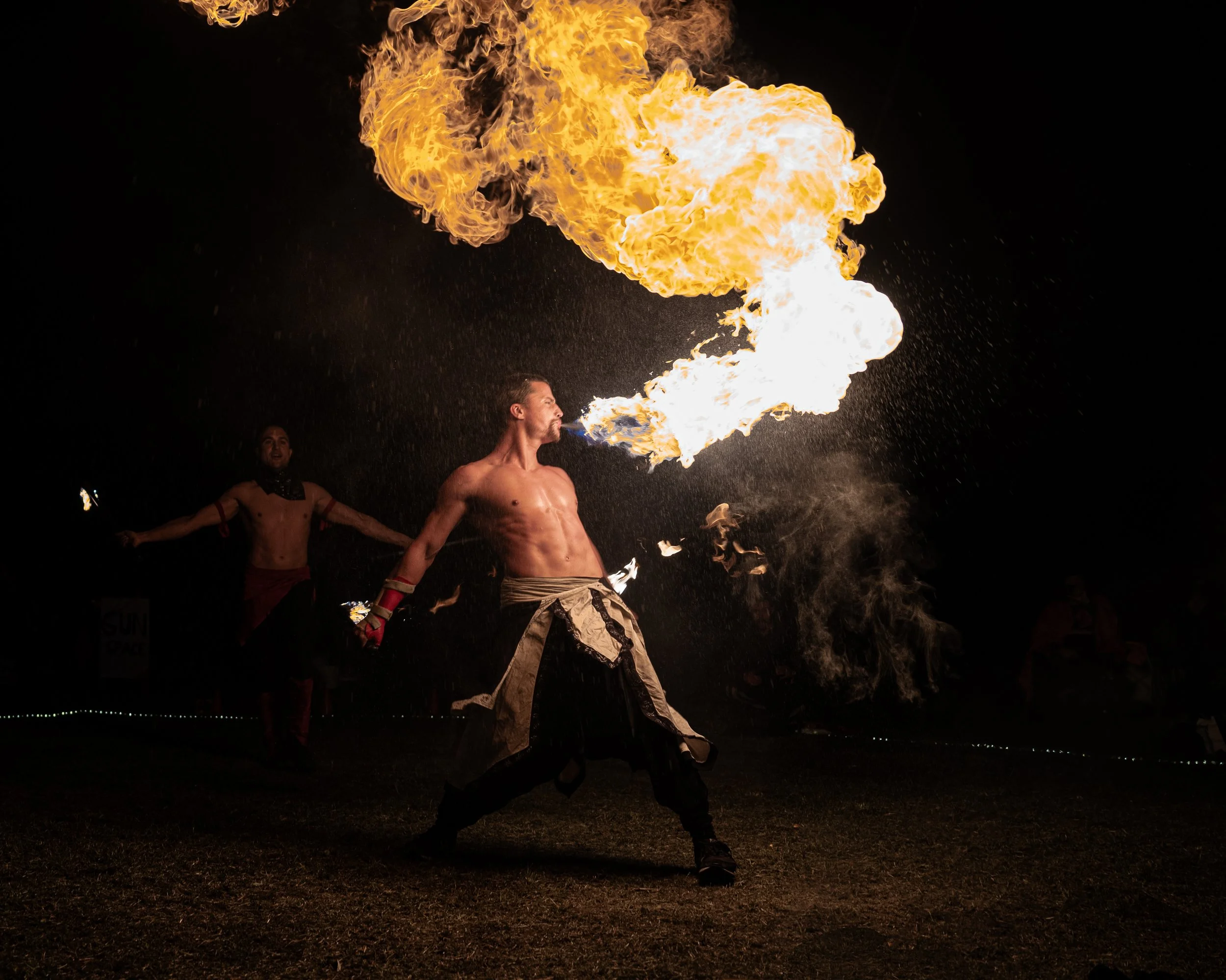 GLOWFEST FESTIVAL AUSTRALIA, FIRE PERFORMER PHOTO BY MYCOL CAVALIERI- SPRITZ THE WORLD STUDIO