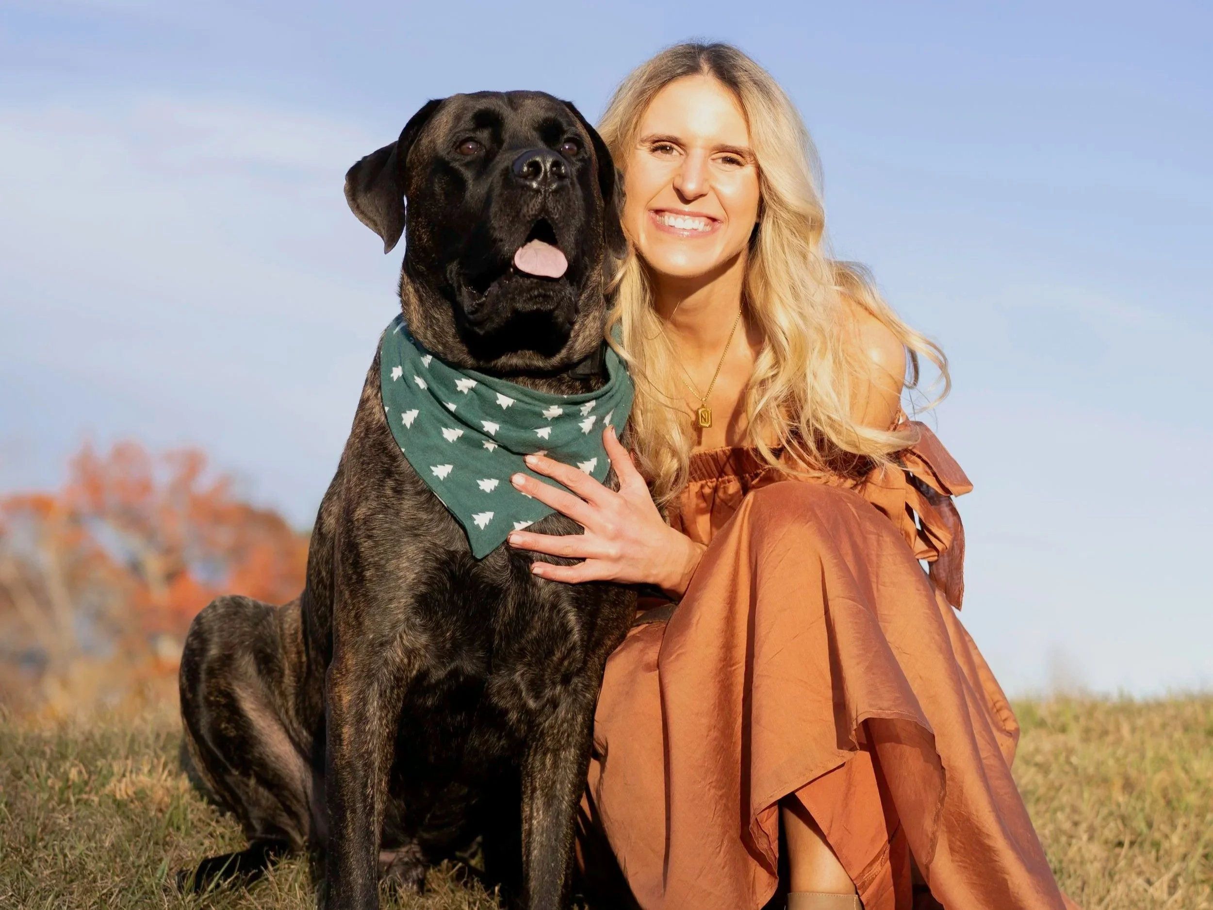 Autumnal photo of woman with her dog