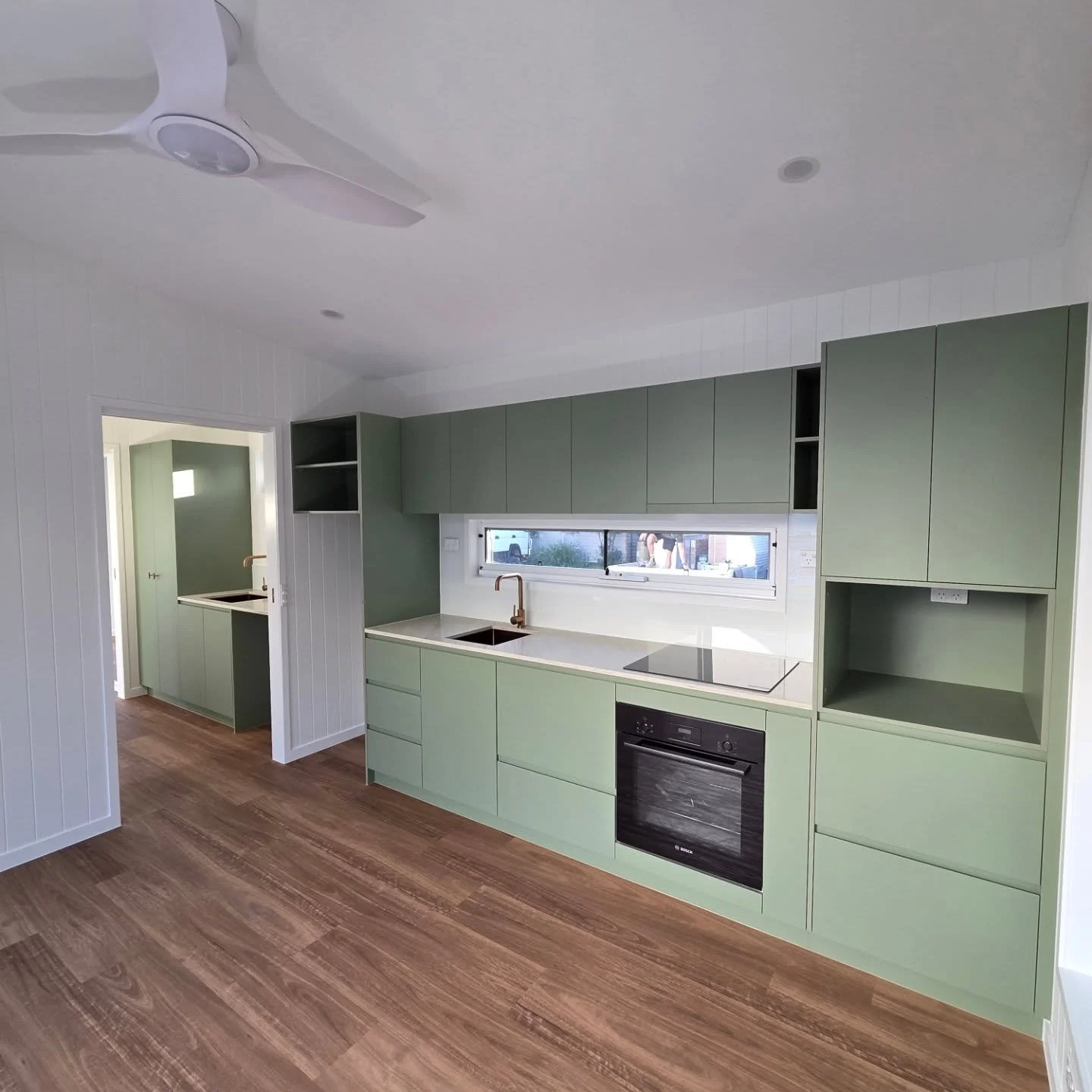 A  custom granny flat (class 1a) with a simple and fully equipped kitchen with everything that you need on a daily basis.

- ABI interiors brushescopper tap &amp; sink
- Bosch  induction cooktop &amp; over
- Fisher &amp; Paykel dishwasher
- Le Taj st