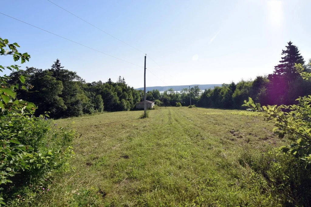 SOLD *** West Lake Ainslie waterfront.......... 229,000