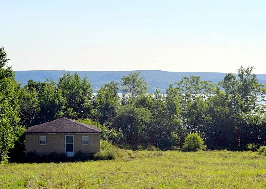 SOLD *** West Lake Ainslie waterfront.......... 229,000