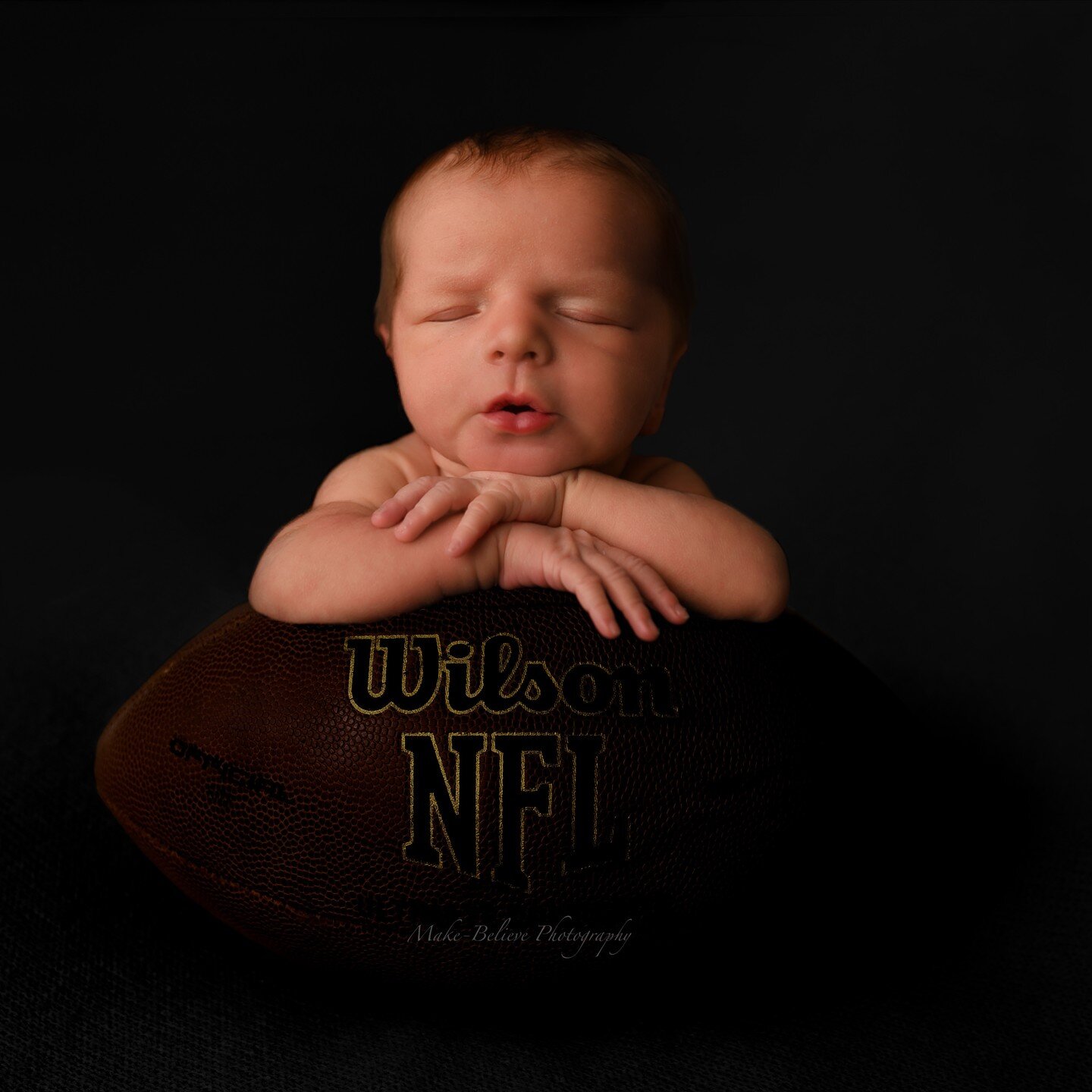 A 100% Digital Composite! Dad help prop baby on a pillow!! Hes a huge football fan and theirs definitly more to come!! Thank you for the opportunity! Baby Roman Ray 🏈