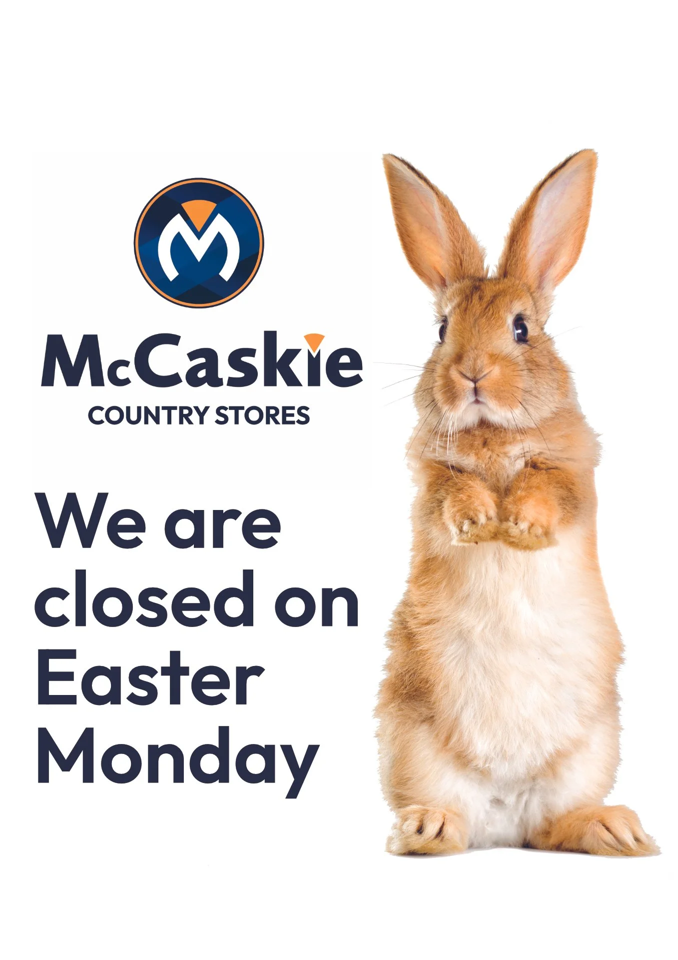 A sign indicating McCaskie Country Stores are closed on Easter Monday, with a large image of a rabbit standing upright.