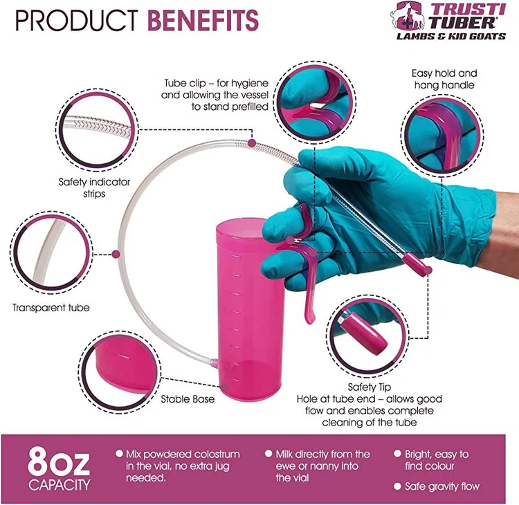 Antahi&rsquo;s labelled diagram of the Trusti Tuber: a gloved hand holding the pink 240ml vessel and the transparent tube, with call-outs for the safety indicator strips, tube clip, hang handle, rounded safety tip and stable base