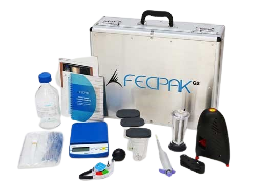The FECPAKG2 kit laid out in its case &mdash; imaging device, sample cassettes, pipettes and accessories