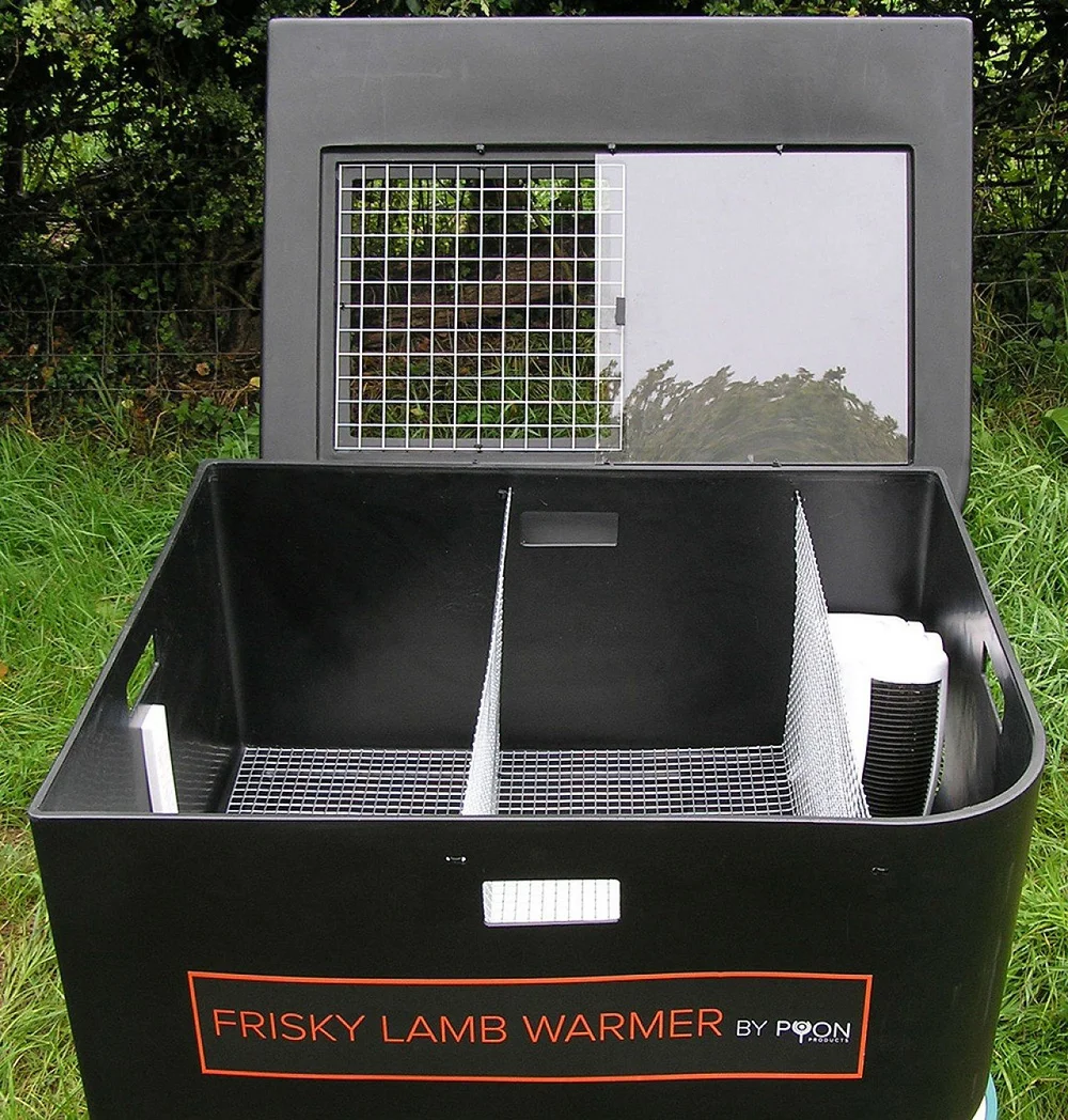The inside of an empty Frisky lamb warmer seen from above, showing the central divider