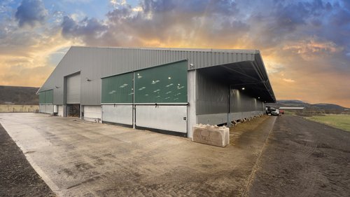 Galebreaker roller blind fitted to the side of a livestock building