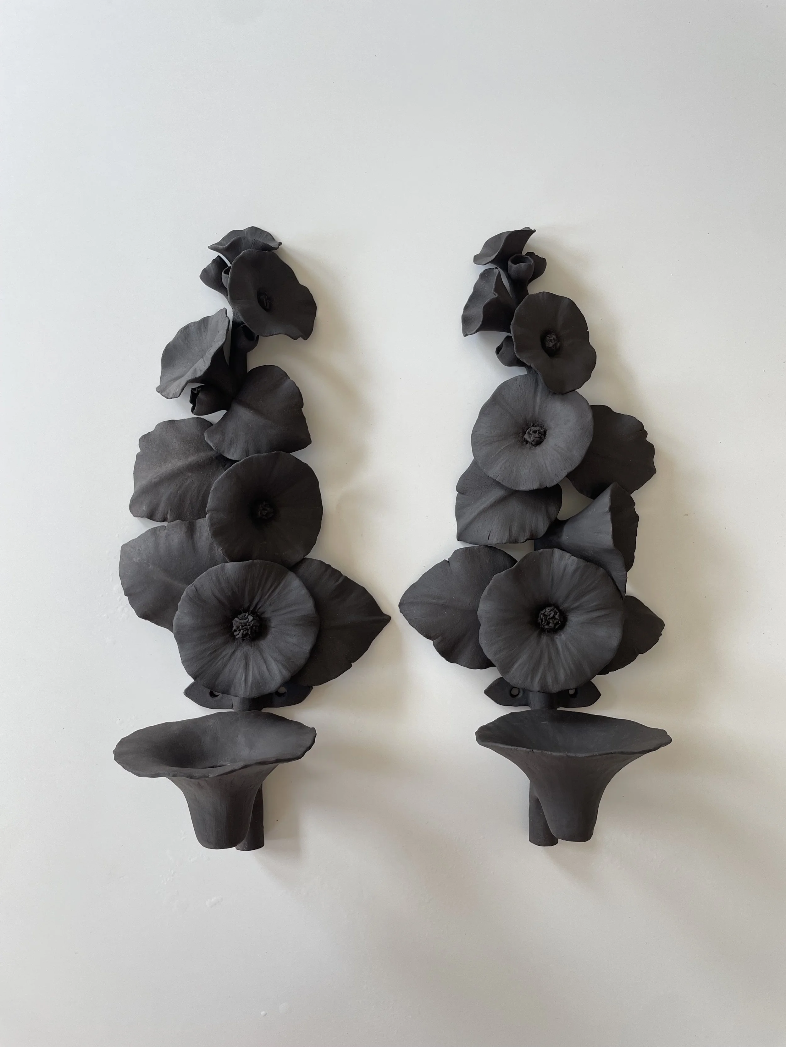 A pair of Hollyhock sconces