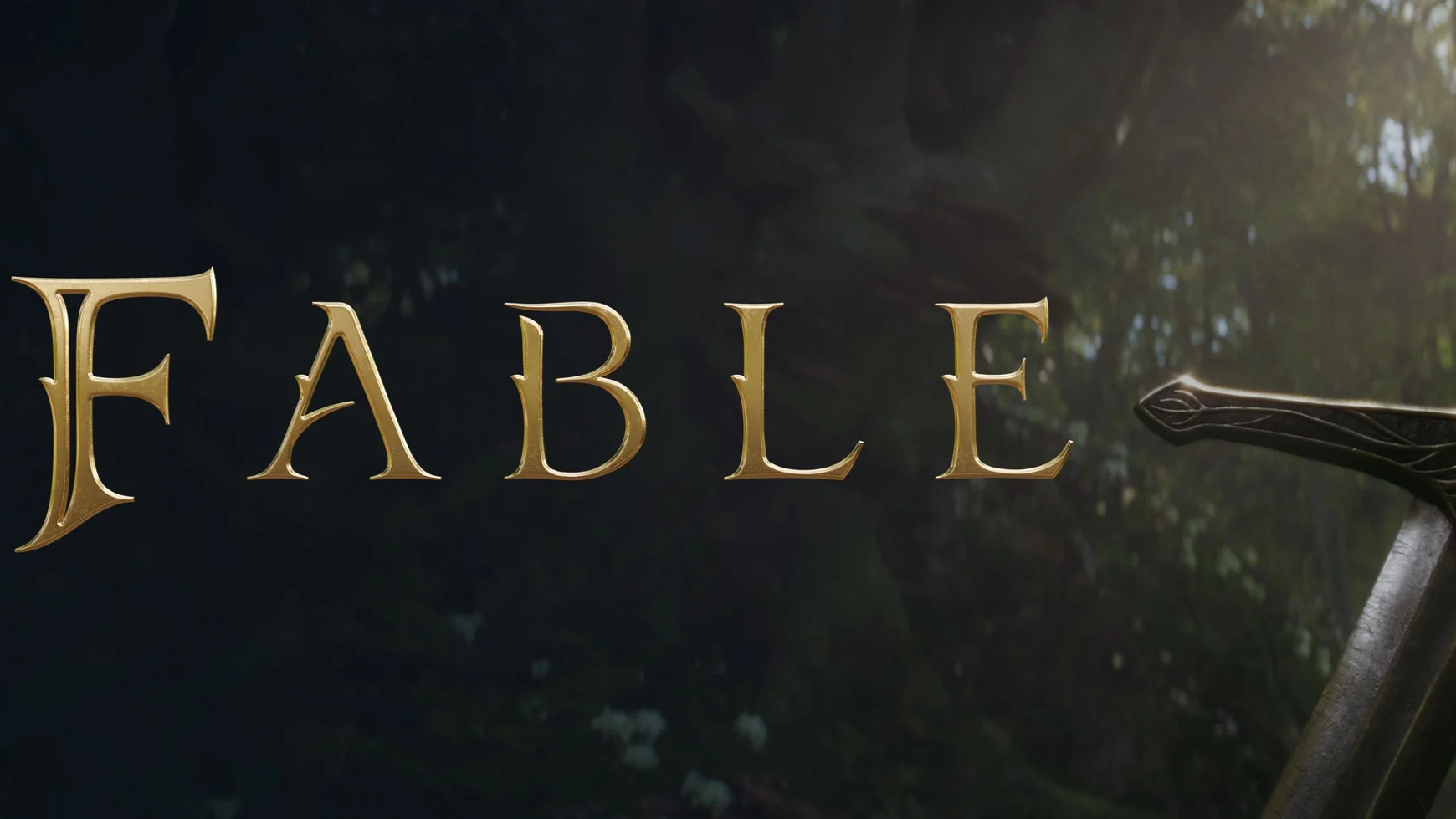 Close-up of the word 'FABLE' written in gold, stylized font on a dark forest background, with part of a metallic object visible on the right side.