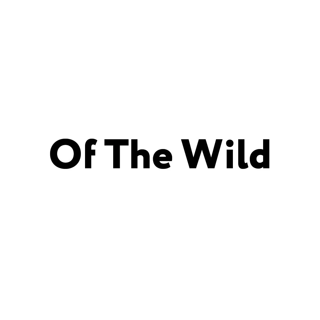 Text in the center of the image that reads 'Of The Wild' in bold black letters on a white background.