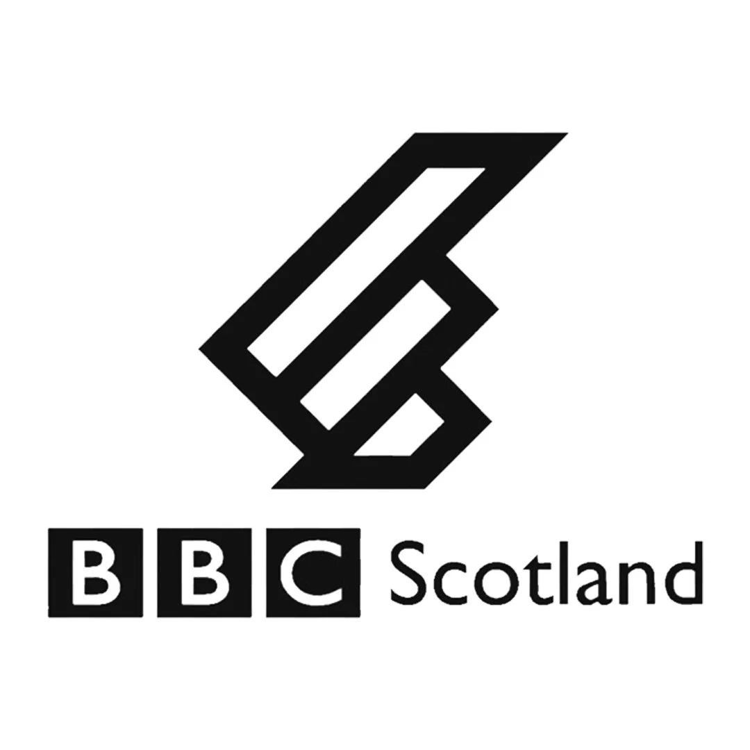 Black and white BBC Scotland logo with stylized geometric emblem and text.