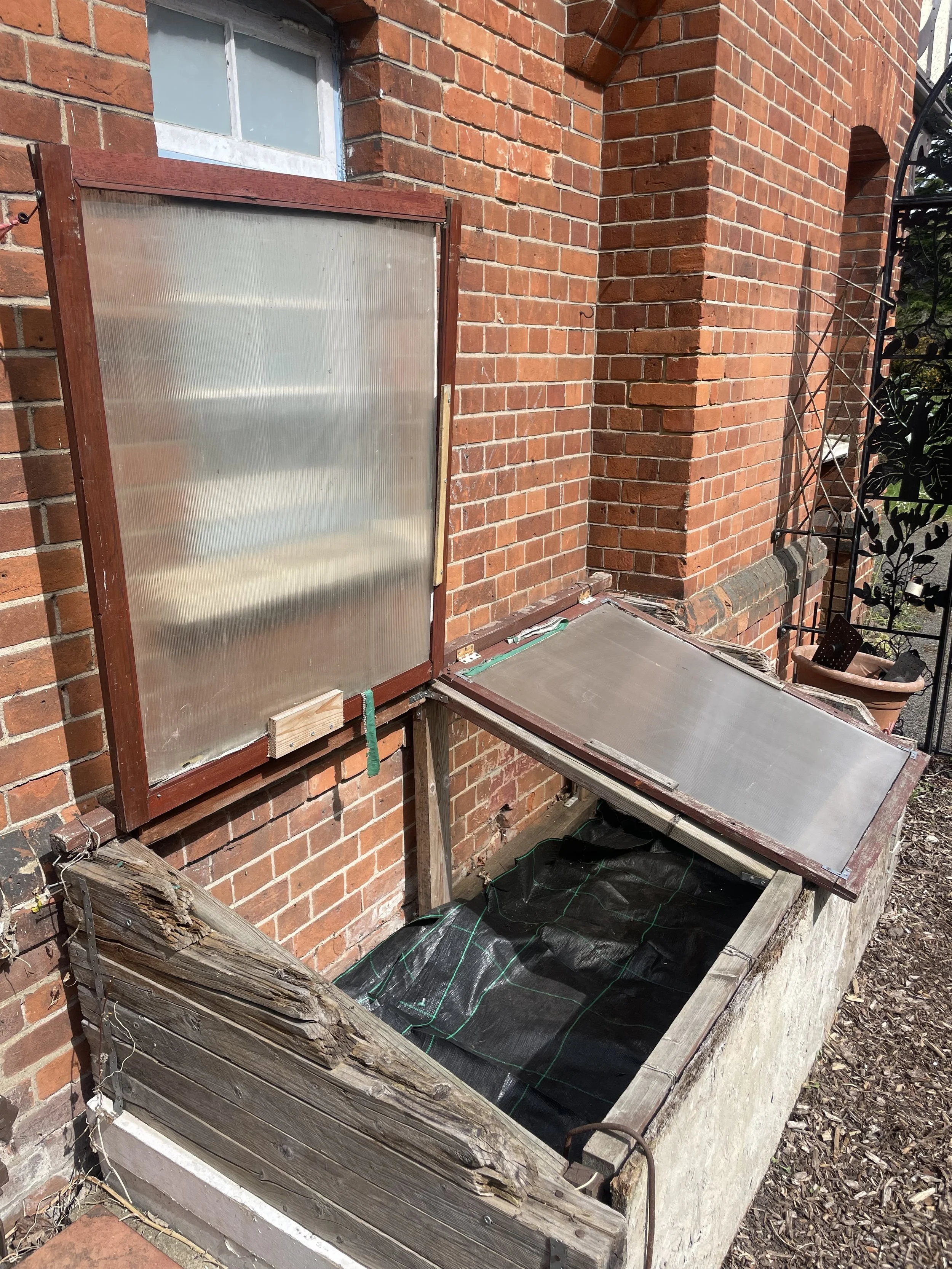 salvaged coldframes we inherited 