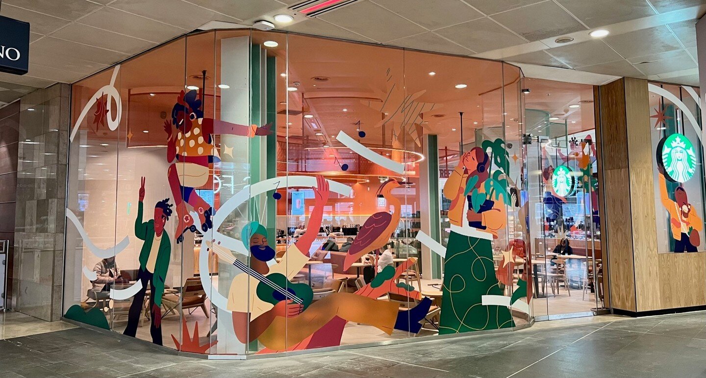 Major refurb for #Starbucks at #Westfield Stratford. Could this be the best window vinyl ever put in a coffee shop? Designed by two local artists commissioned to capture the energy and spirit of the people who live, work and play in Stratford.