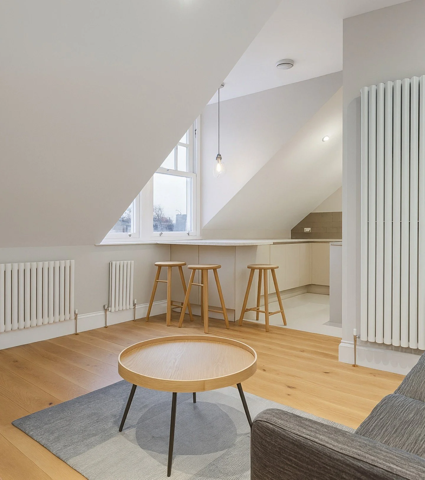 Tucking a studio into an existing roof, just!