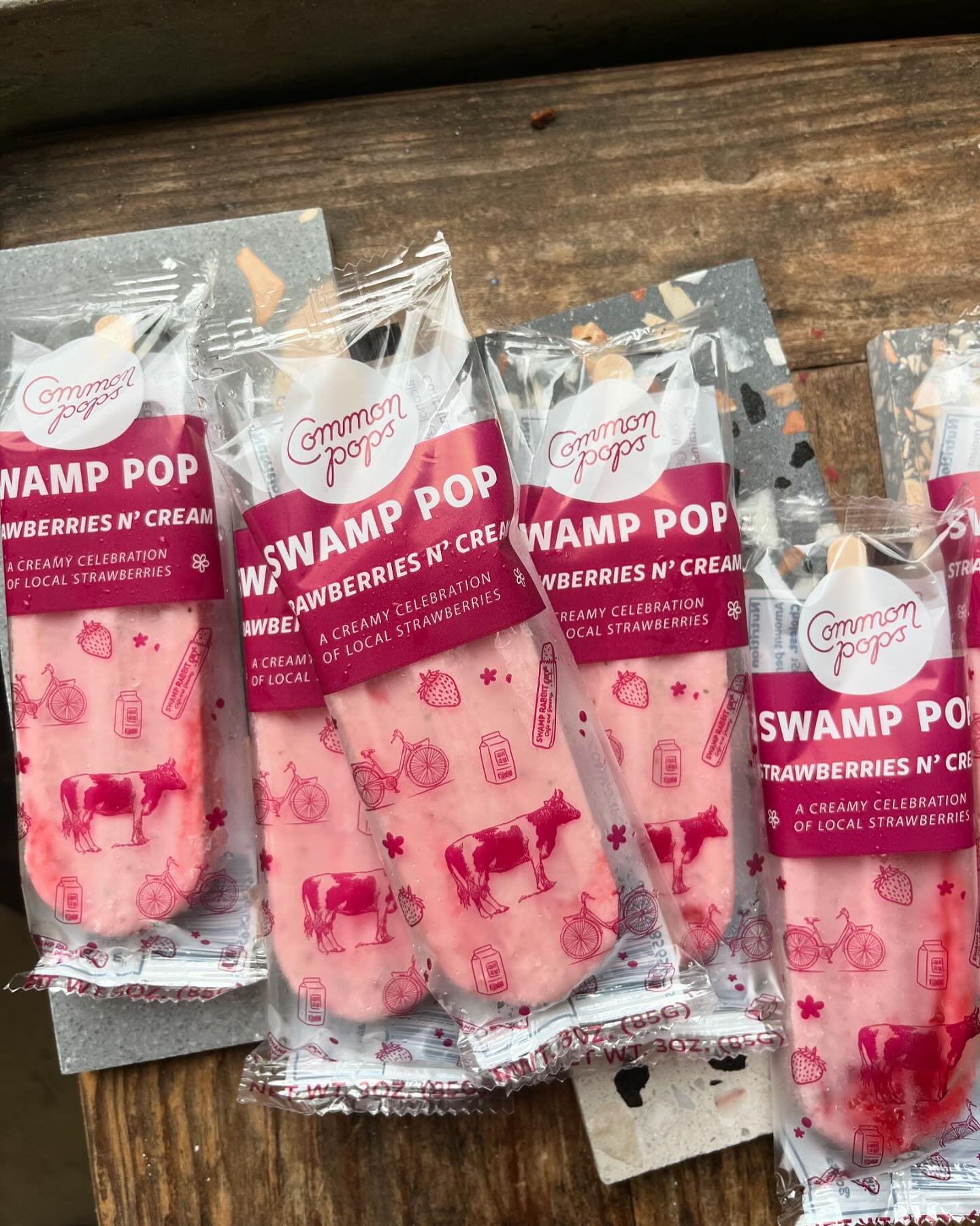 A popsicle maker and a grocer walk into a room. BAM! @commonpops x @swamprabbitcafe Swamp Pop is born! Taking one of our most favorite local fruits, the strawberry, and mixing it up with some cream and sugar, meet the ultimate popsicle jam of 2024. #