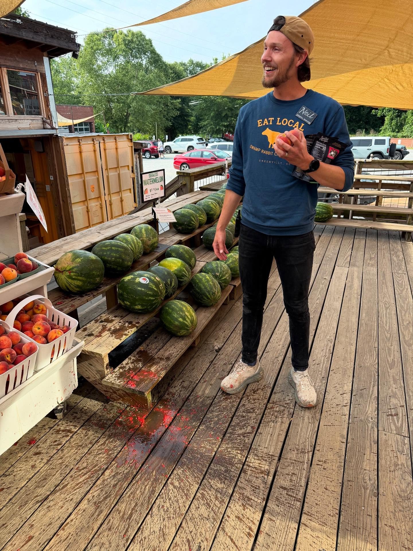 Sometimes watermelon disaster strikes on a Thursday morning, and you&rsquo;ve just gotta laugh it off. Neil handles the splash zone like a champ.