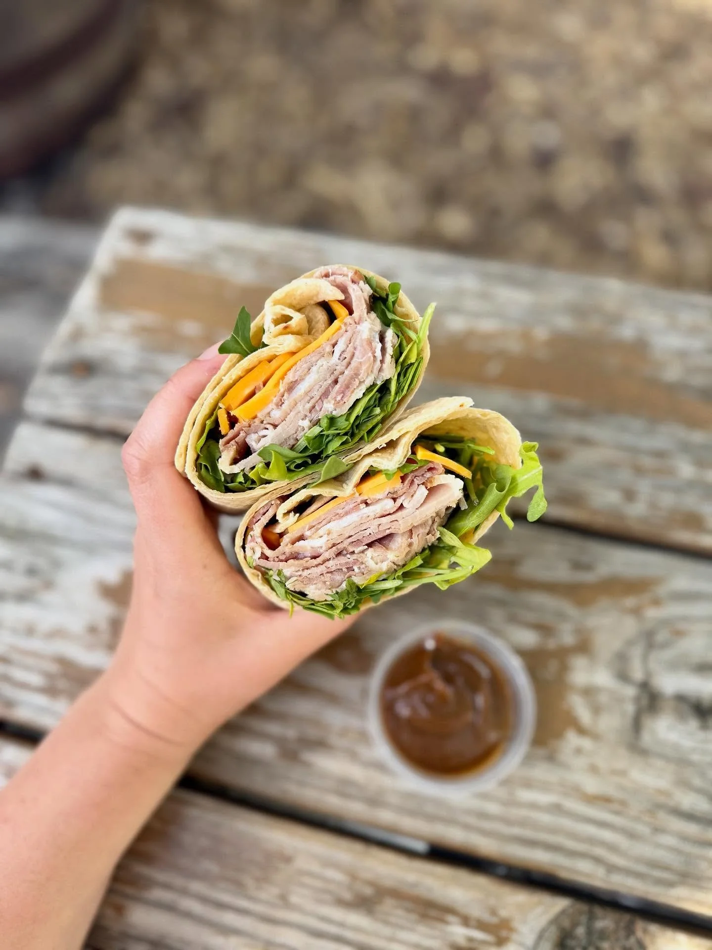 Apple butter dip, wrap with the ham (WITH THE HAM!). It&rsquo;s our new smoked ham &amp; apple butter wrap. Made with @hickorynutgap ham, red onion, @ashe_county_cheese cheddar, fresh spinach, and @imladrisfarm apple butter. Nom on it!