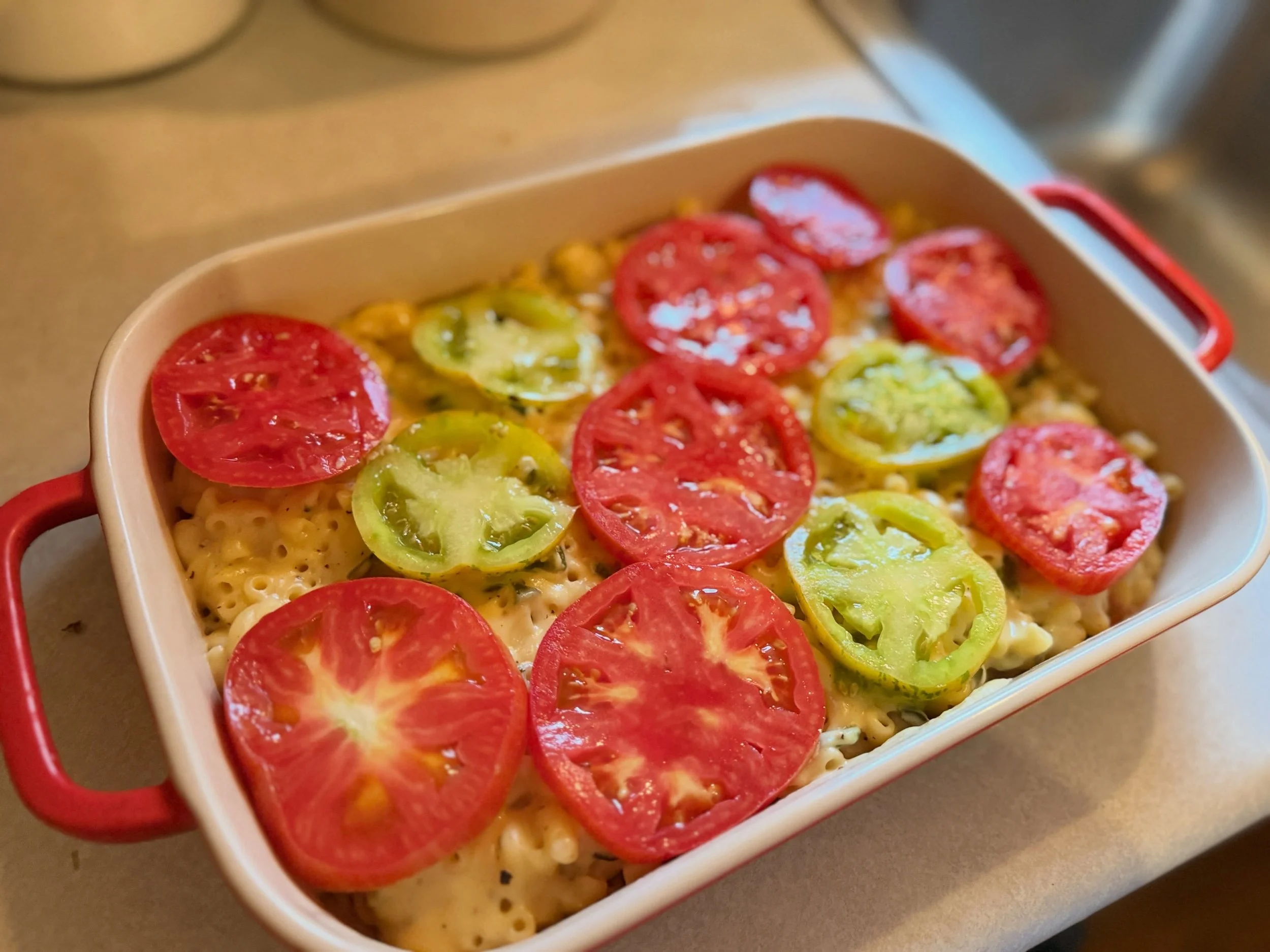 Ina said to put tomatoes and breadcrumbs on top of your mac &amp; cheese, and who are we to ignore the Contessa&rsquo;s orders? Gotta soak up every single second of tomato season.