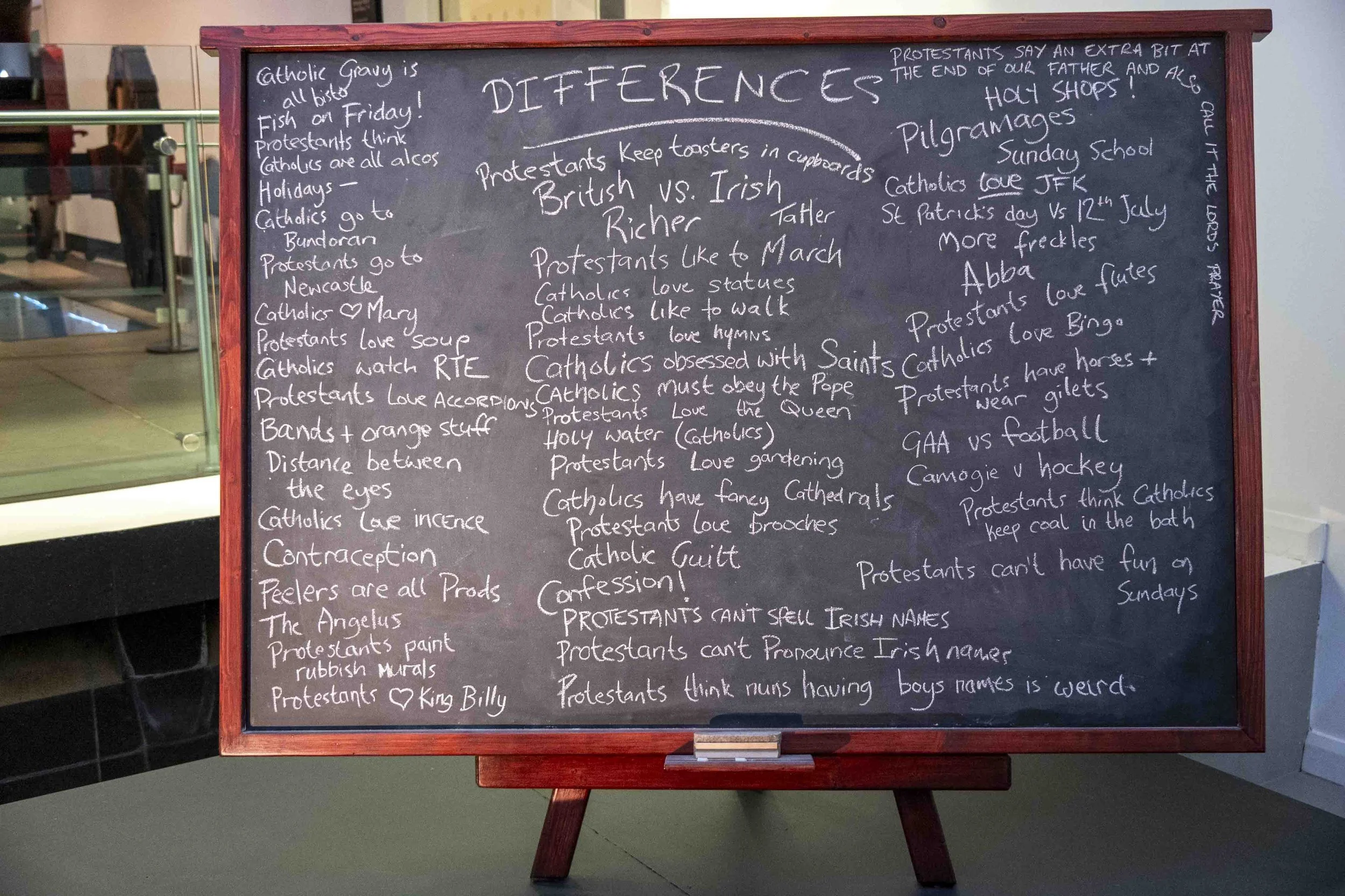 The Chalkboard from Season 2 Episode 1 of "Derry Girls," in which Catholic and Protestant children write about their differences