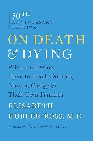 Book cover of “On Death and Dying” by Elisabeth Kübler-Ross, featuring the title in large serif text on a pale blue background. The cover is of the 50th Anniversary edition.
