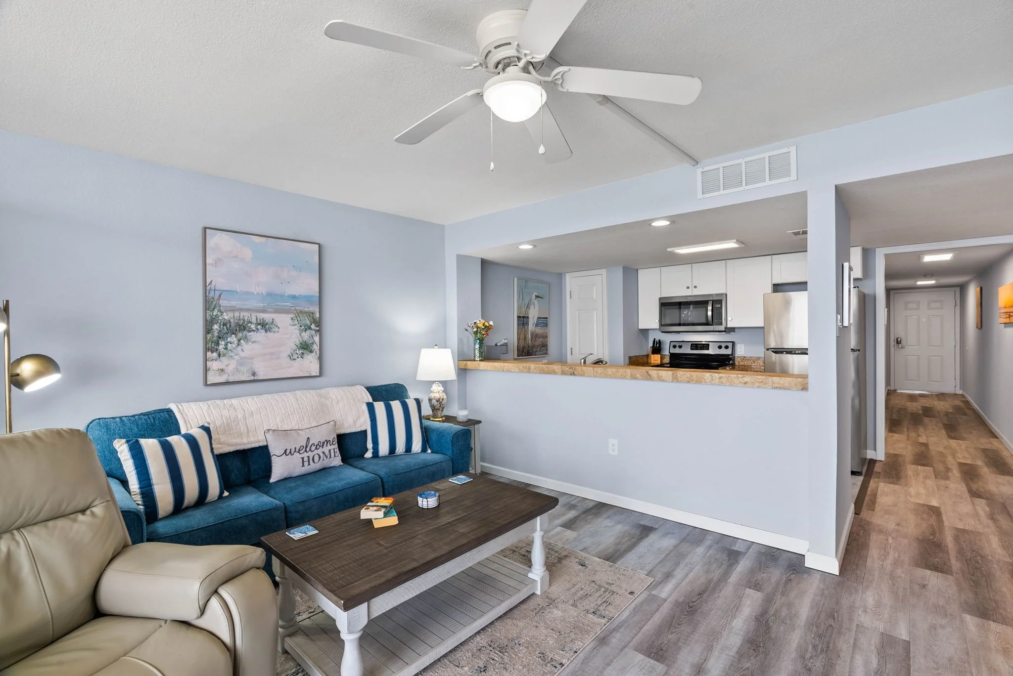 Open coastal living space with kitchen and seating at Dayspring 402 Laguna Reef Rockport TX