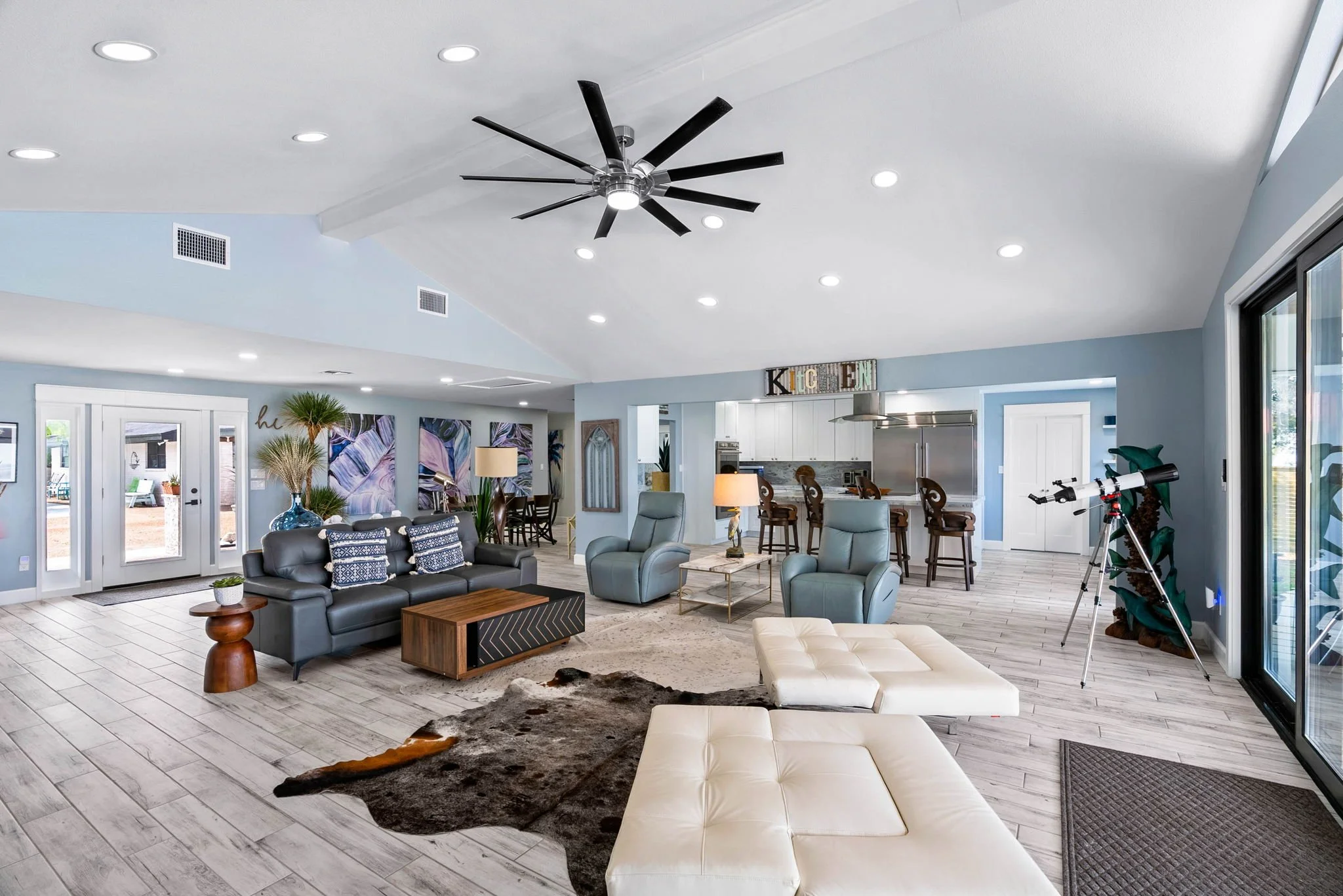 Modern great room with designer furnishings and open layout in a luxury Rockport TX coastal home.