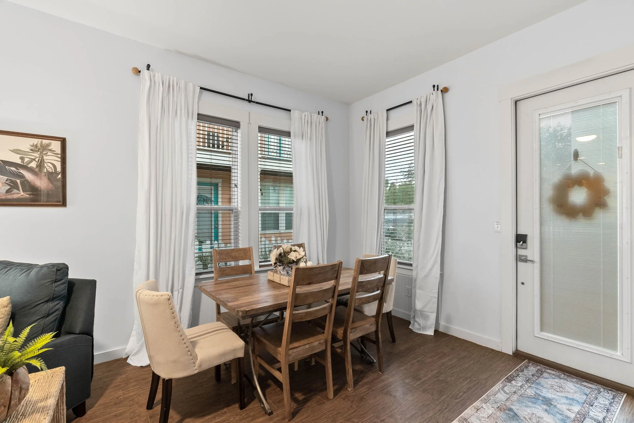 Cozy dining area with large windows at Marina Del Rey Rockport vacation home