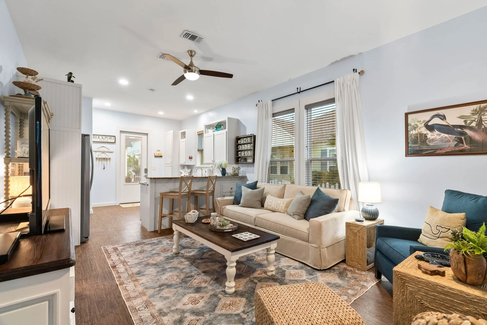 Family-friendly Rockport TX vacation rental with open kitchen, dining, and living area at Marina Del Rey