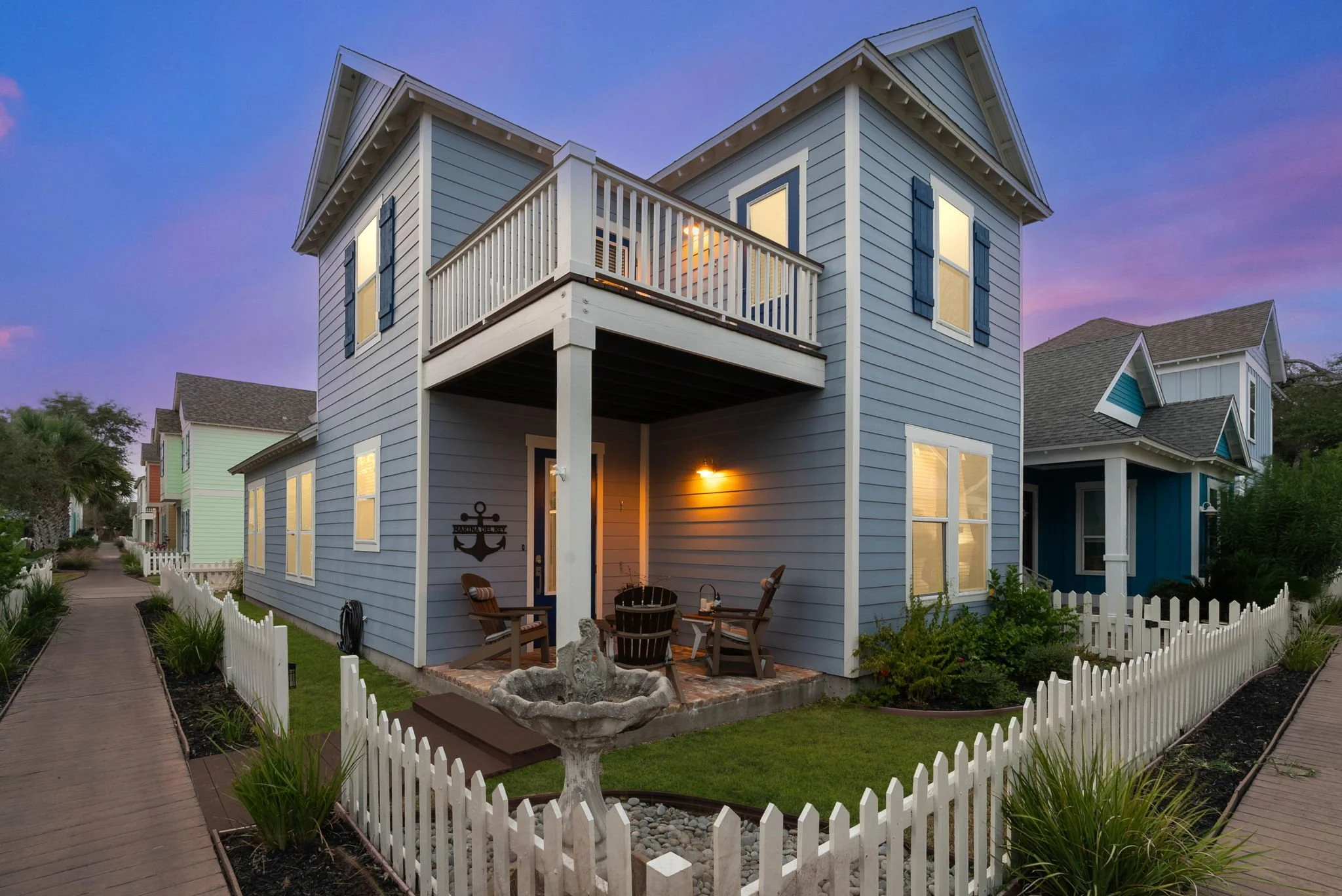 Aerial photo of Marina Del Rey vacation rental community in Rockport TX at sunset, near the waterfront