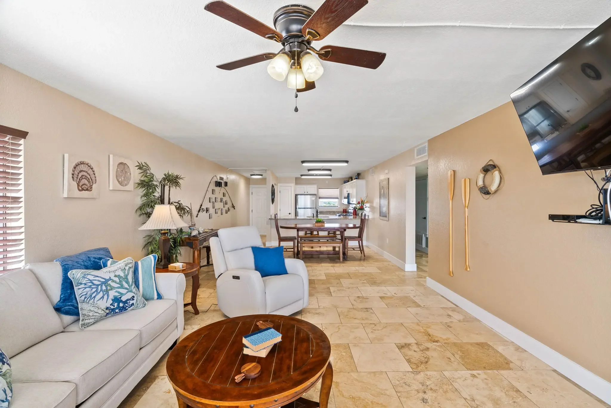 Living room with queen sleeper sofa and bay view windows – Grandview condo Rockport