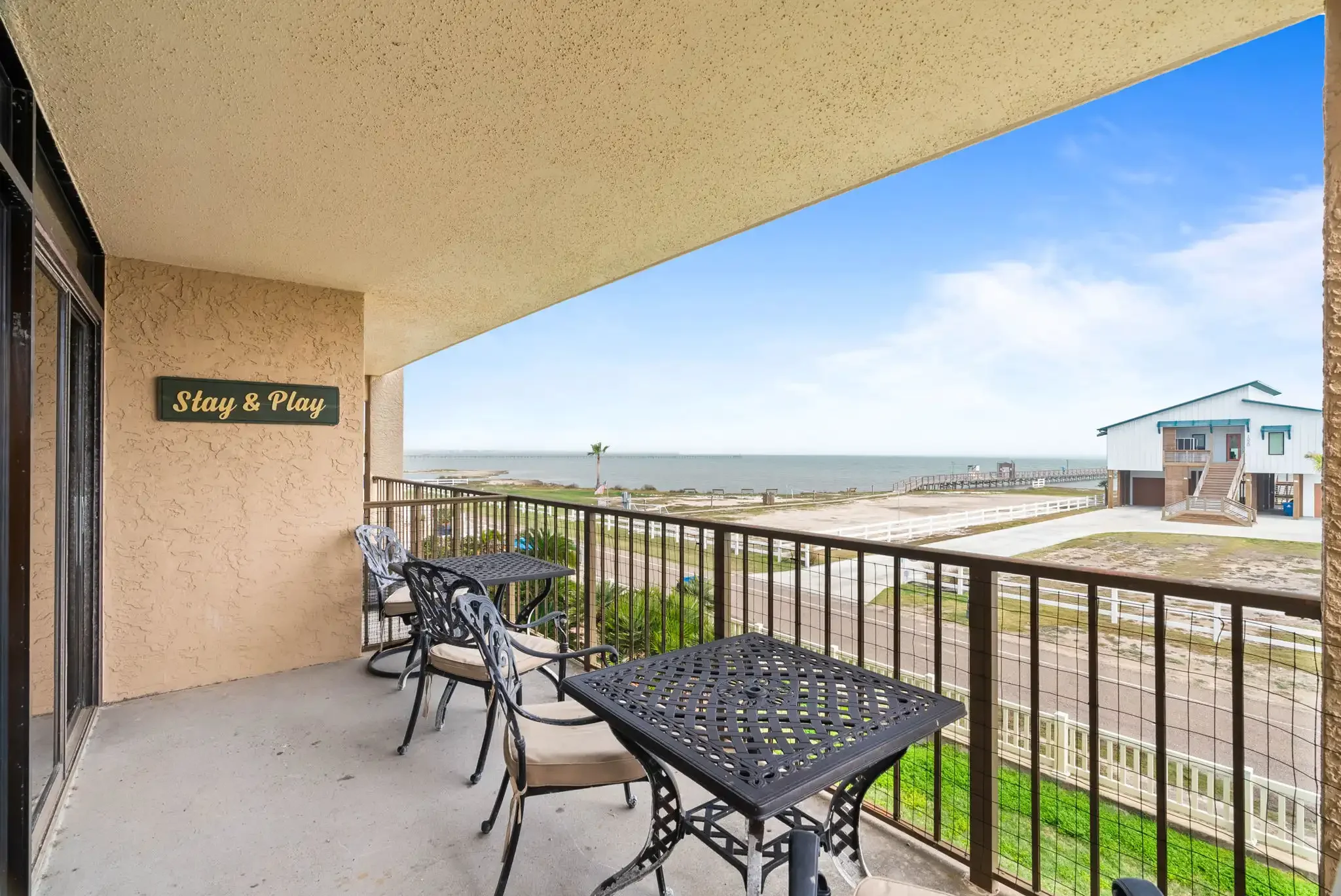 Private balcony at Cool Runnings condo overlooking Aransas Bay in Rockport, Texas
