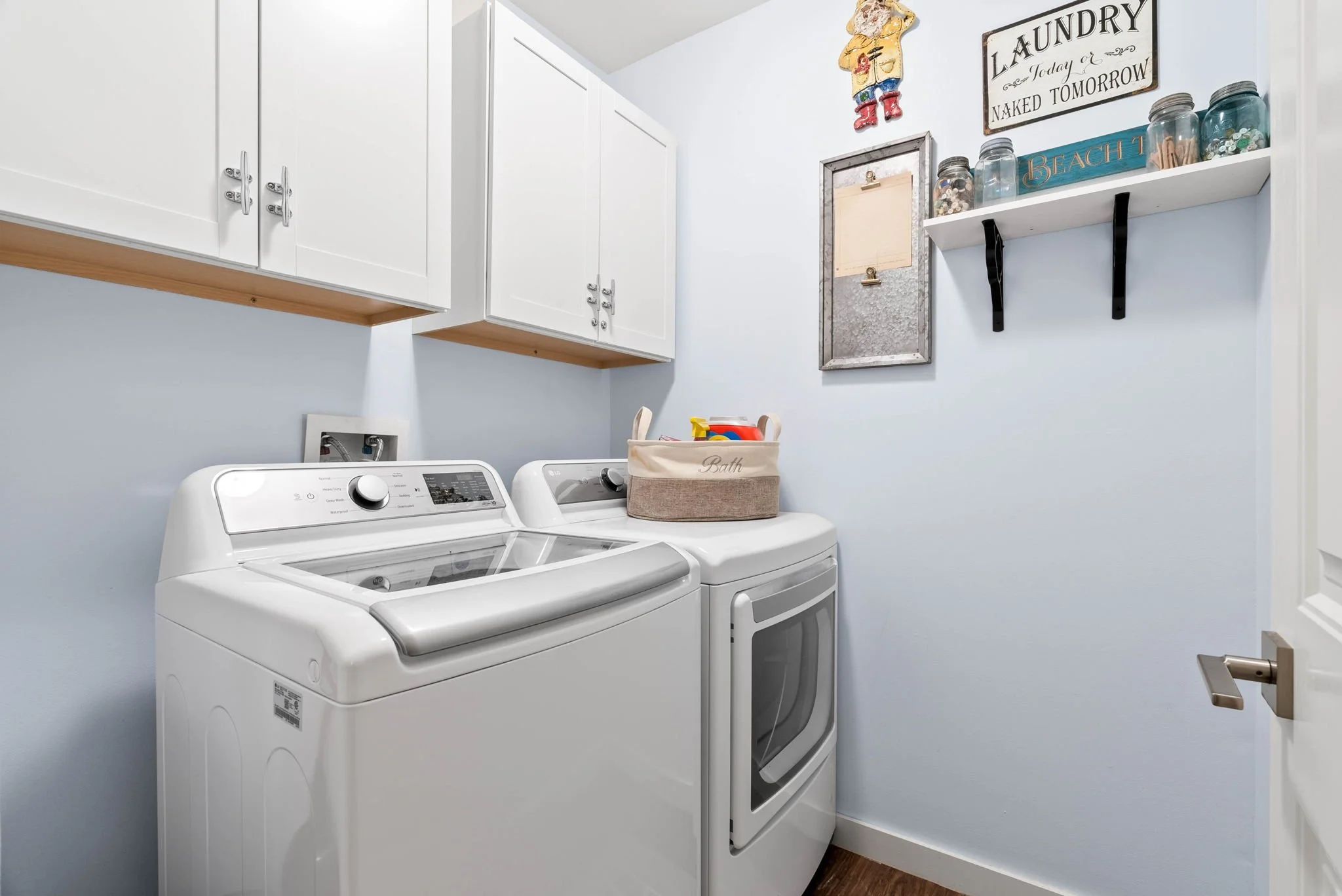 Laundry room with washer and dryer at Marina Del Rey vacation rental in Rockport Texas, perfect for extended stays