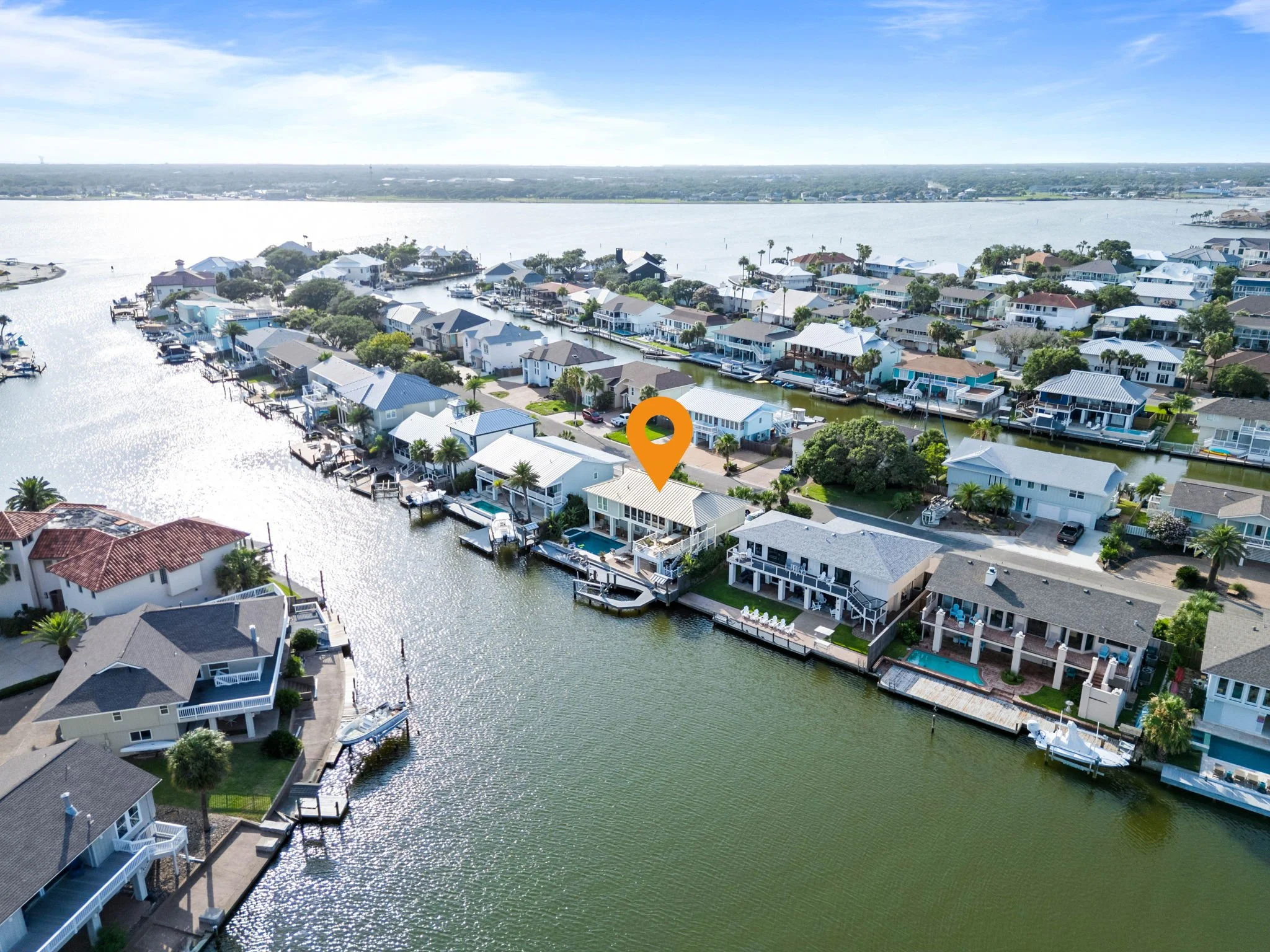 Aerial view showing waterfront Rockport TX vacation rental minutes from Aransas Bay and coastal attractions.