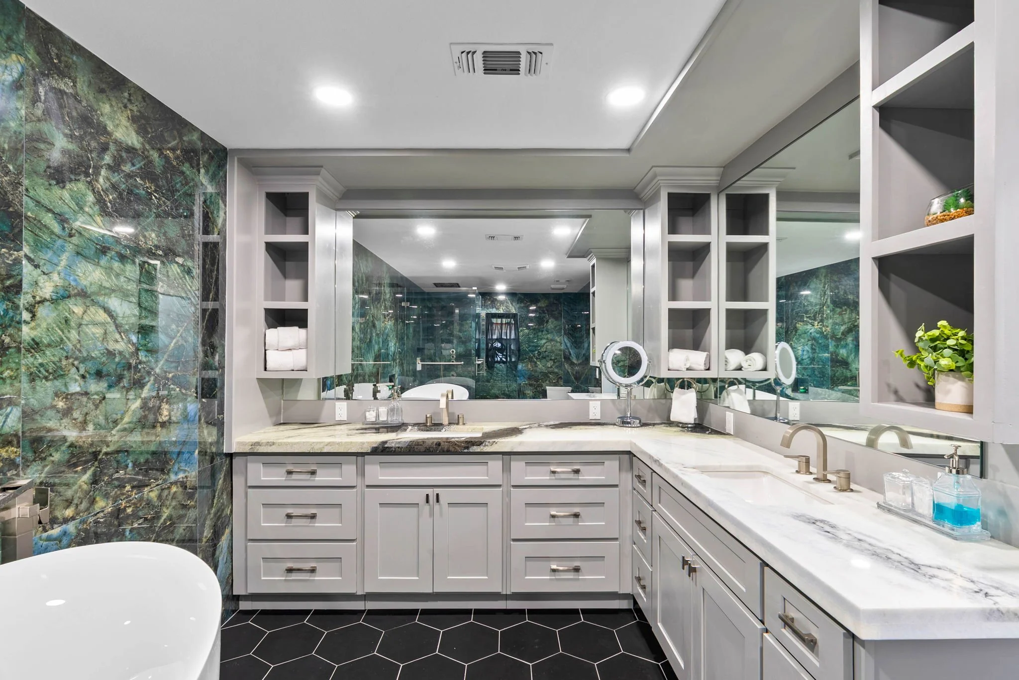Spacious double vanity and spa-inspired primary bath in a luxury Rockport TX coastal home.