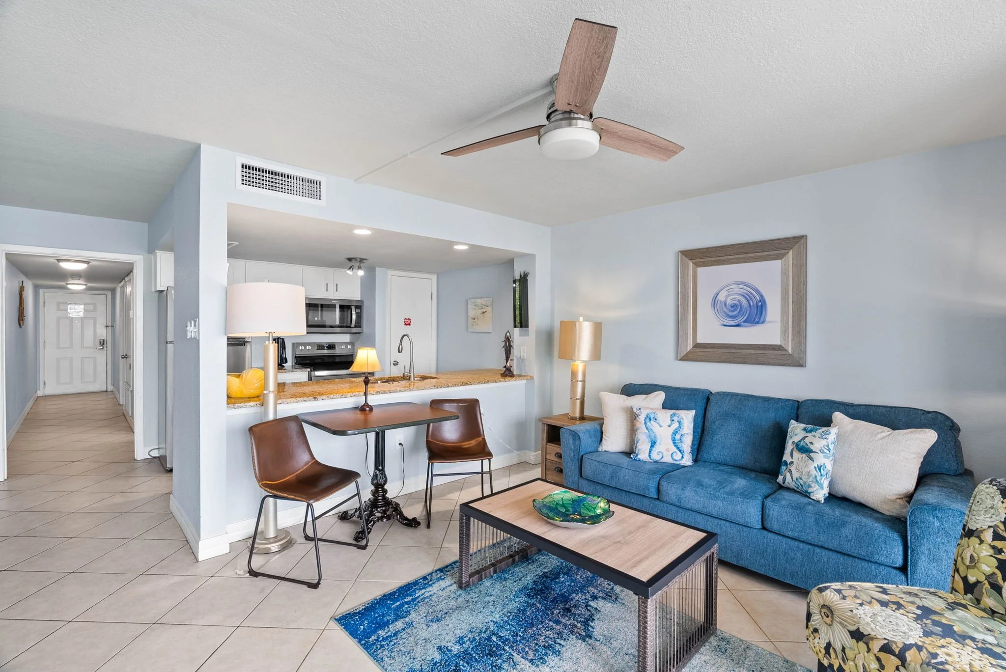 Open living area with coastal décor and breakfast table in Tradewinds Unit 305 Laguna Reef Rockport TX