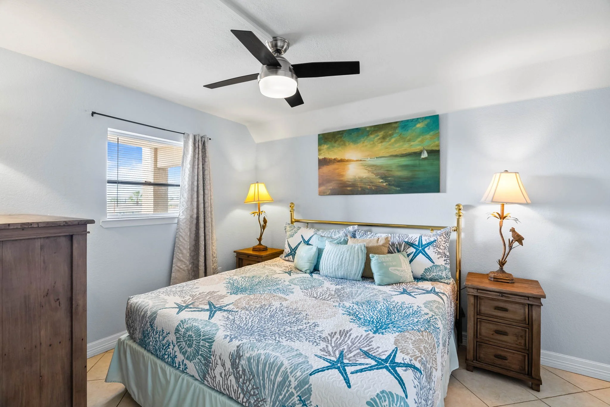 Beach-inspired king bedroom with coastal décor at Tradewinds Unit 305, Laguna Reef Rockport TX vacation rental