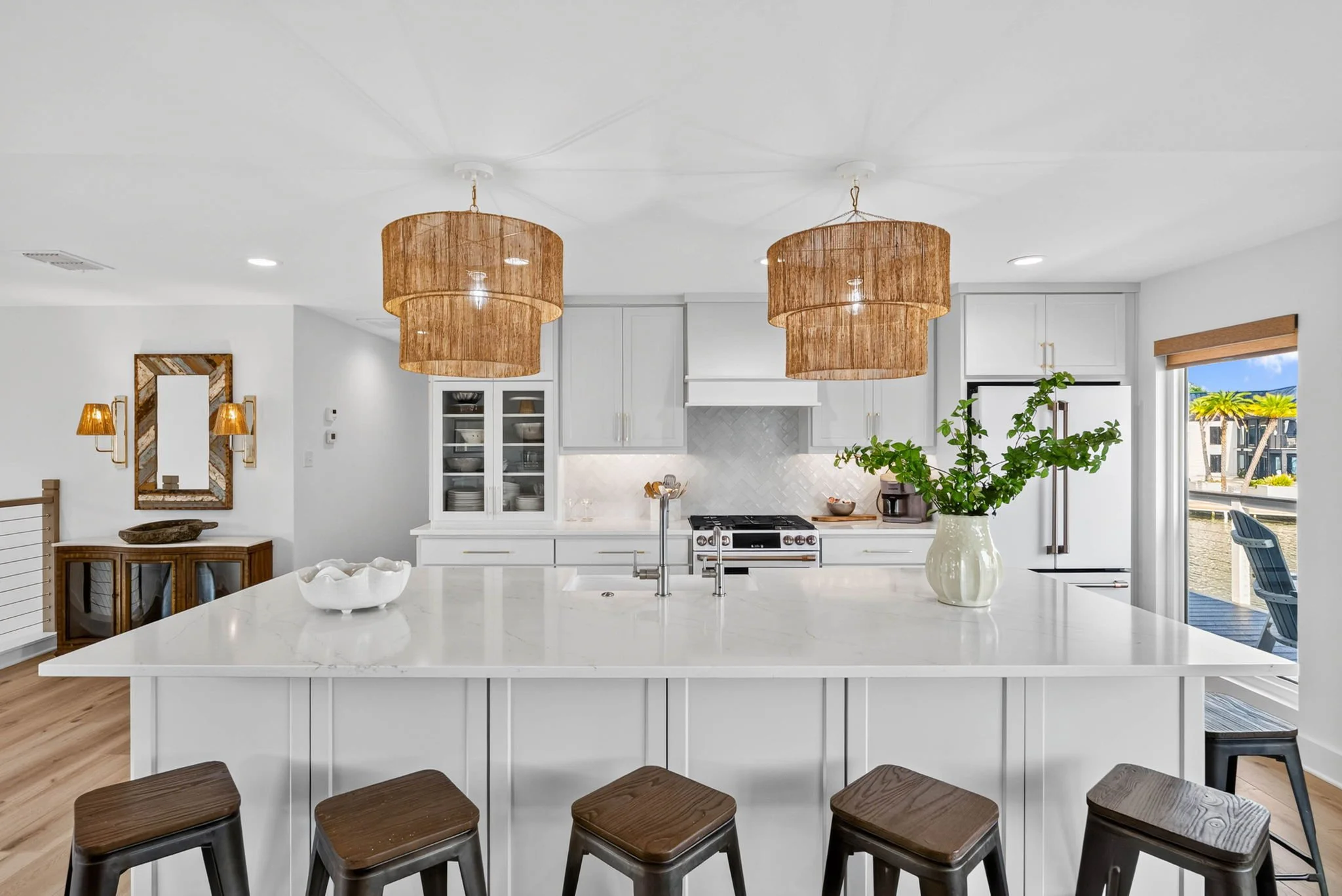 Chef's kitchen with oversized quartz island in George's Landing luxury waterfront vacation rental in Rockport TX 
