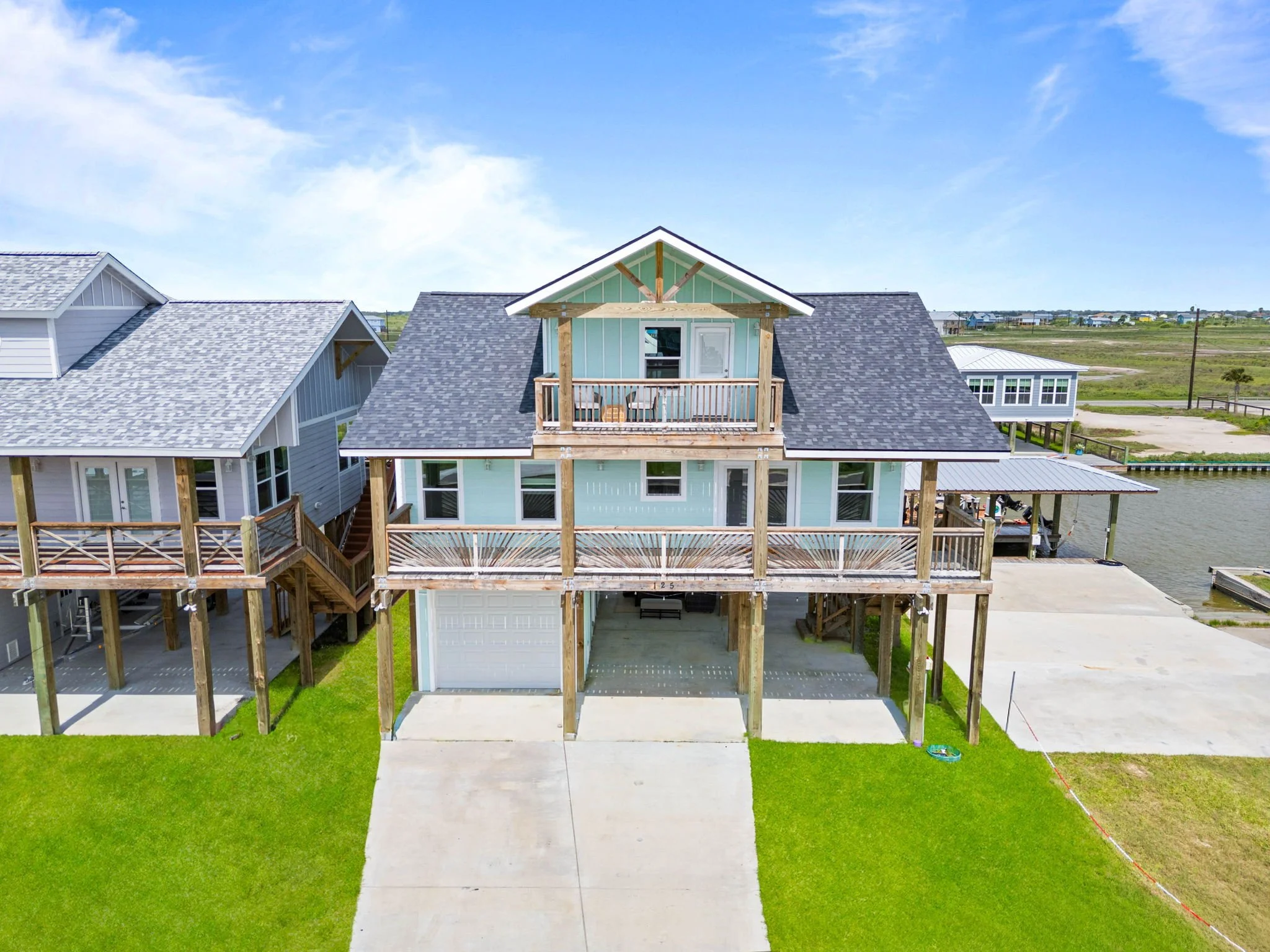Belaire Breeze canal-front home with private dock access near Rockport TX vacation rental