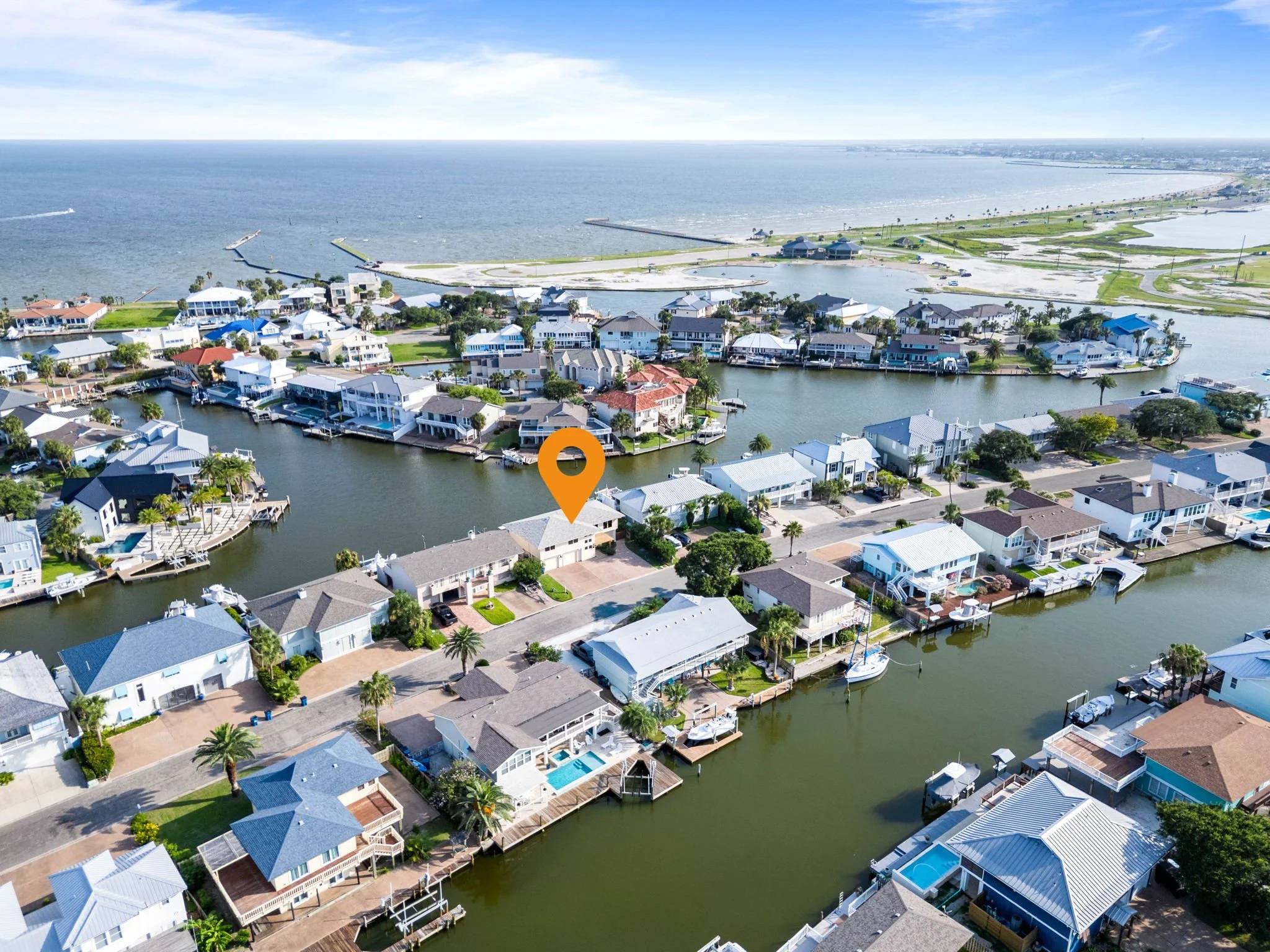 Aerial view showing waterfront Rockport TX vacation rental minutes from Aransas Bay and coastal attractions. 