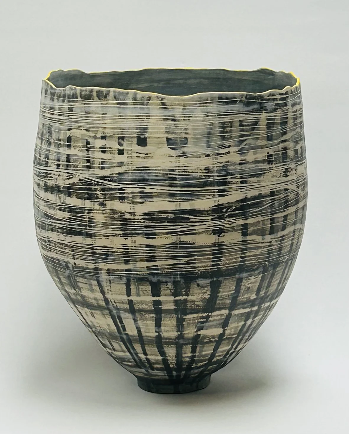  Zack   
Stoneware clay body with incised lines. Layered with slip, underglaze and fired to 1260 degrees and finished with renaissance wax. 