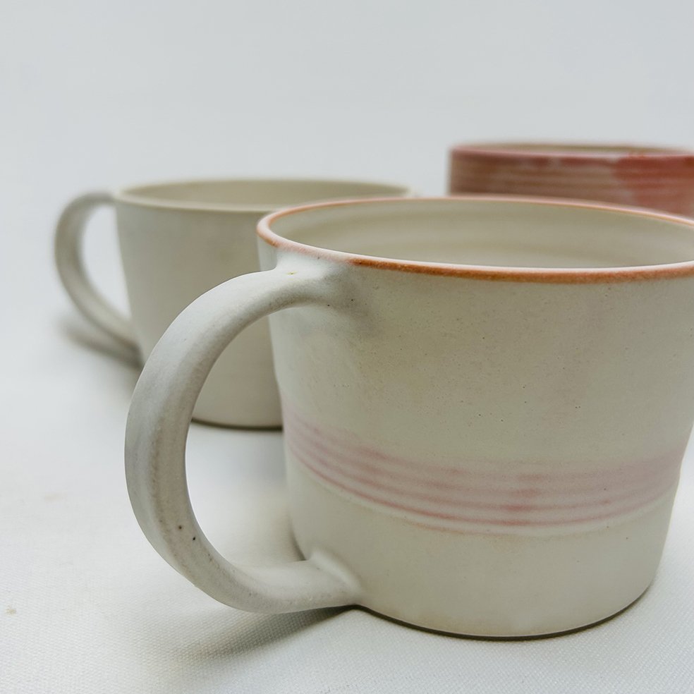 Sonny Collection
White stoneware with pink and orange details