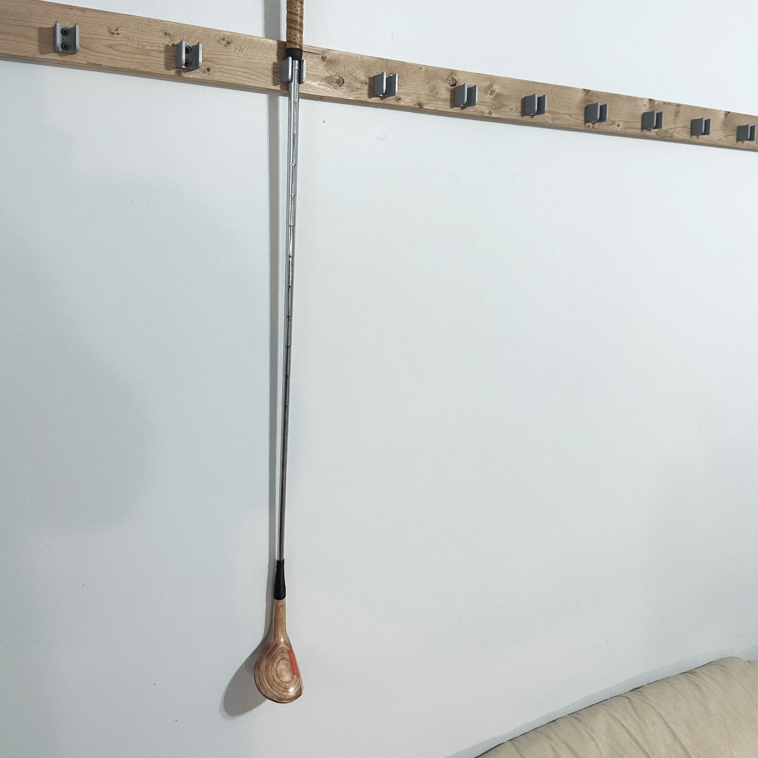 3 wood hanging from wall